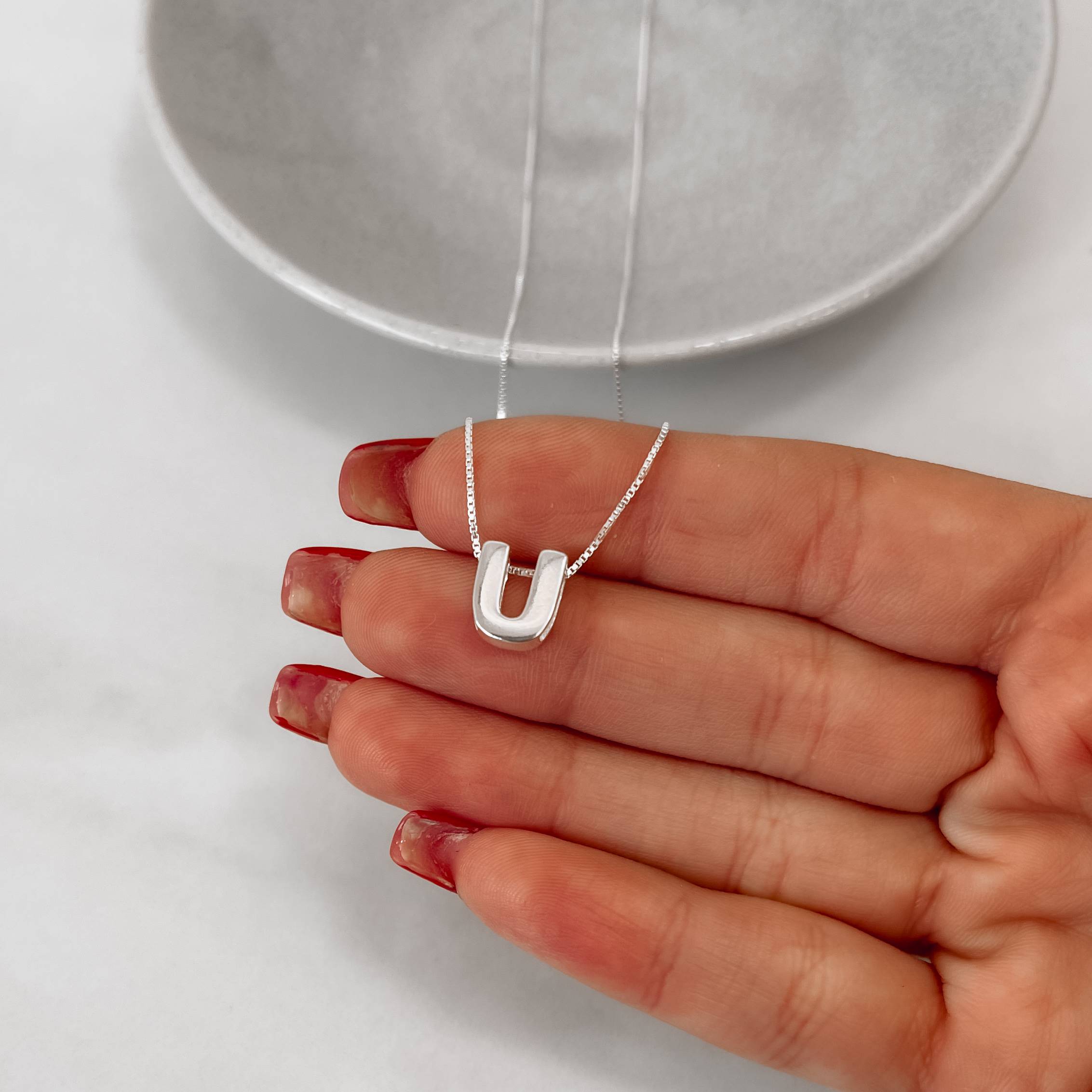 Imagem Secundária Colar letra U 9mm 45cm