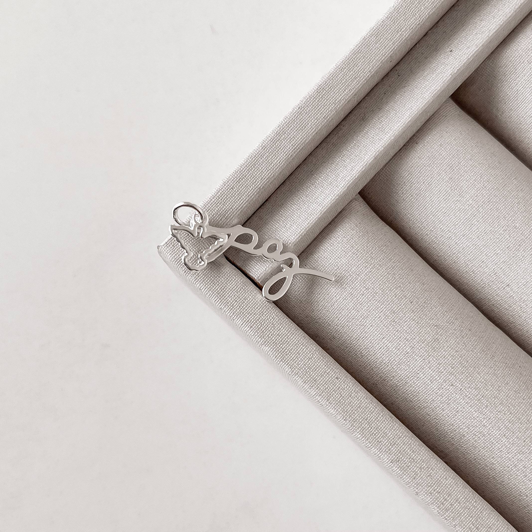 Pingente paz e Espírito Santo