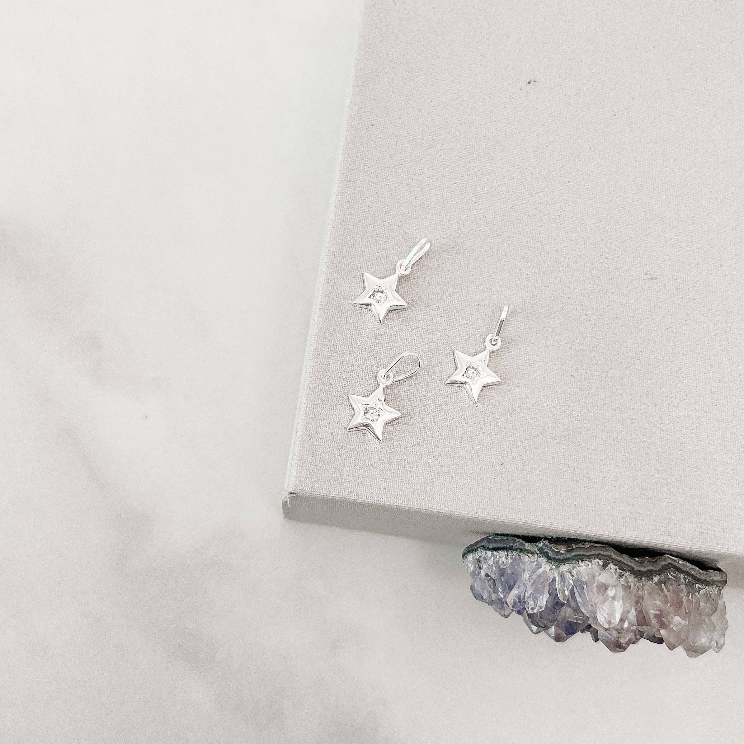 Imagem Secundária Pingente estrela com zircônia 9mm