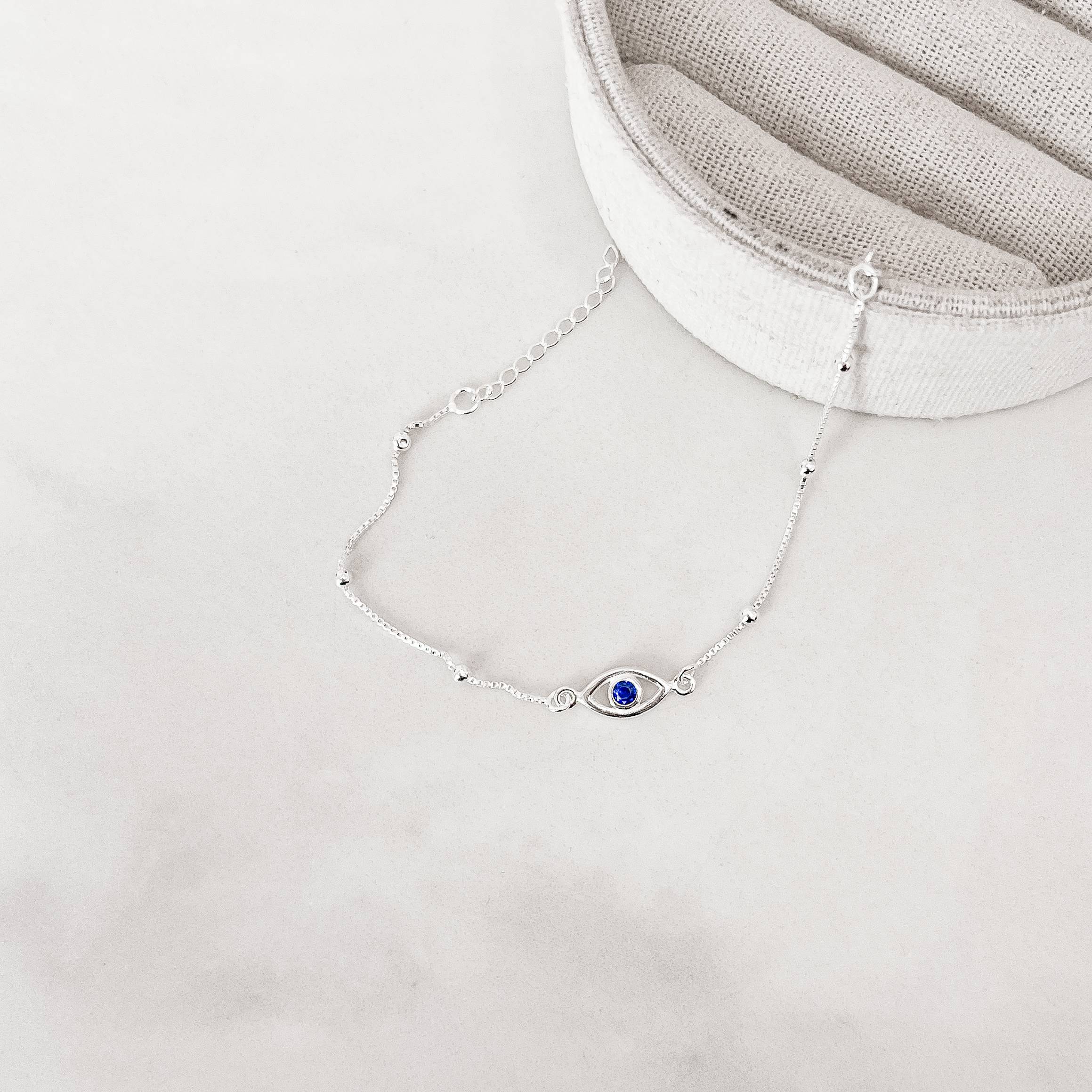 Imagem Pulseira entremeios olho grego 12mm com bolas