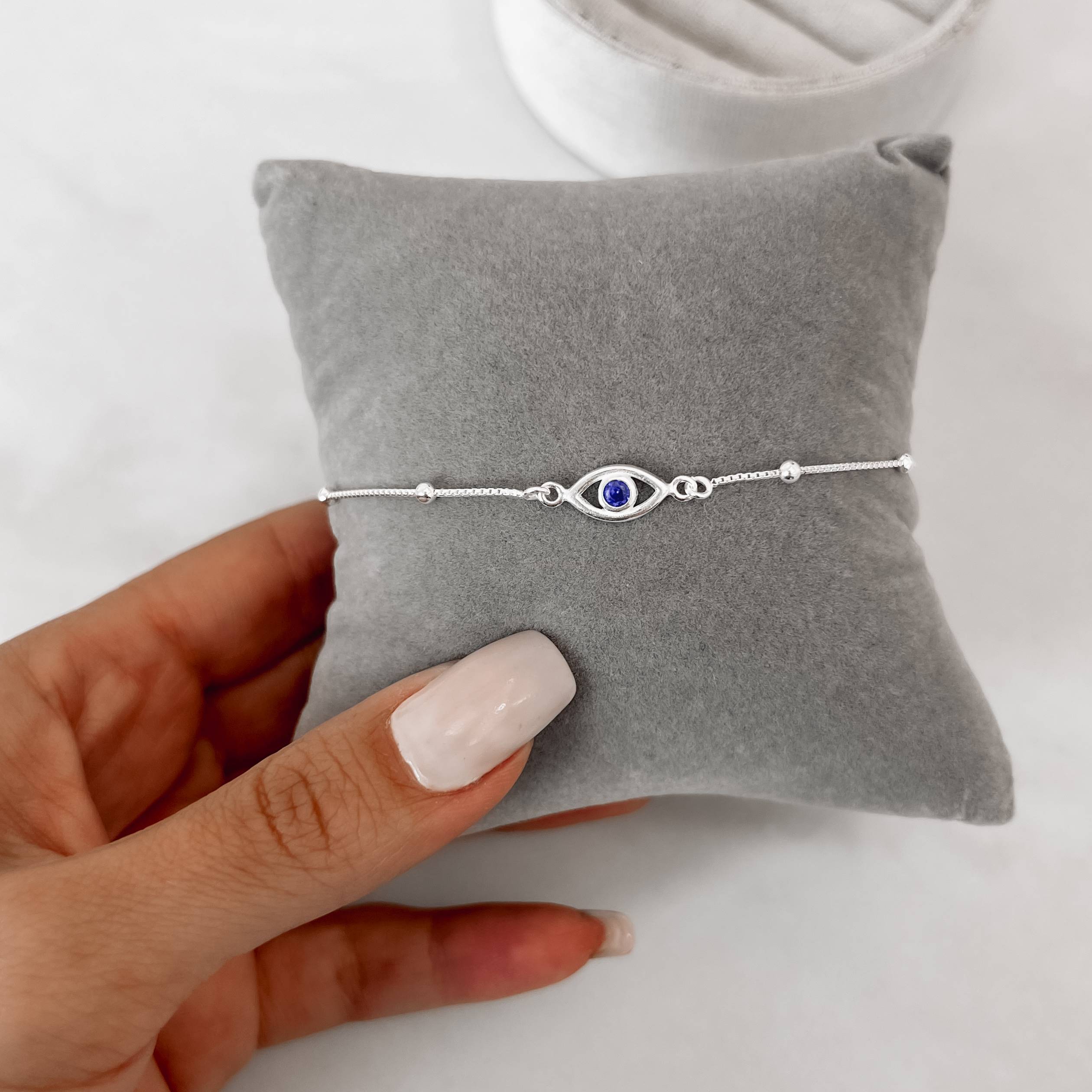 Imagem Secundária Pulseira entremeios olho grego 12mm com bolas