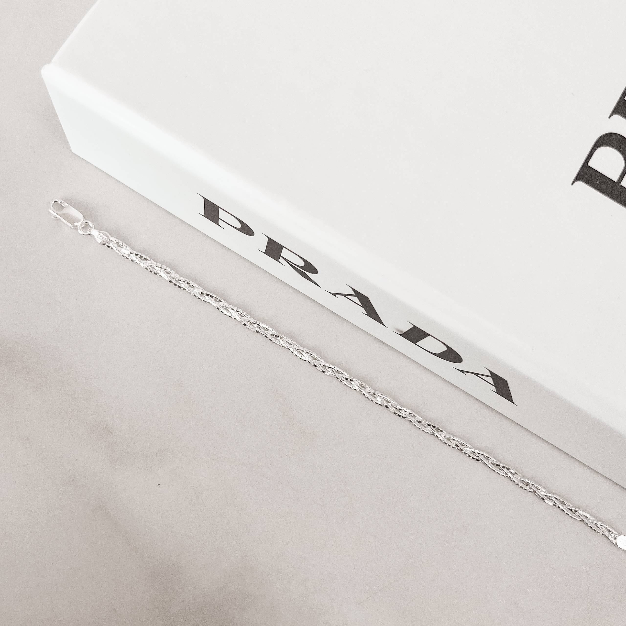 Pulseira corrente trança 3 fios riscados 18cm