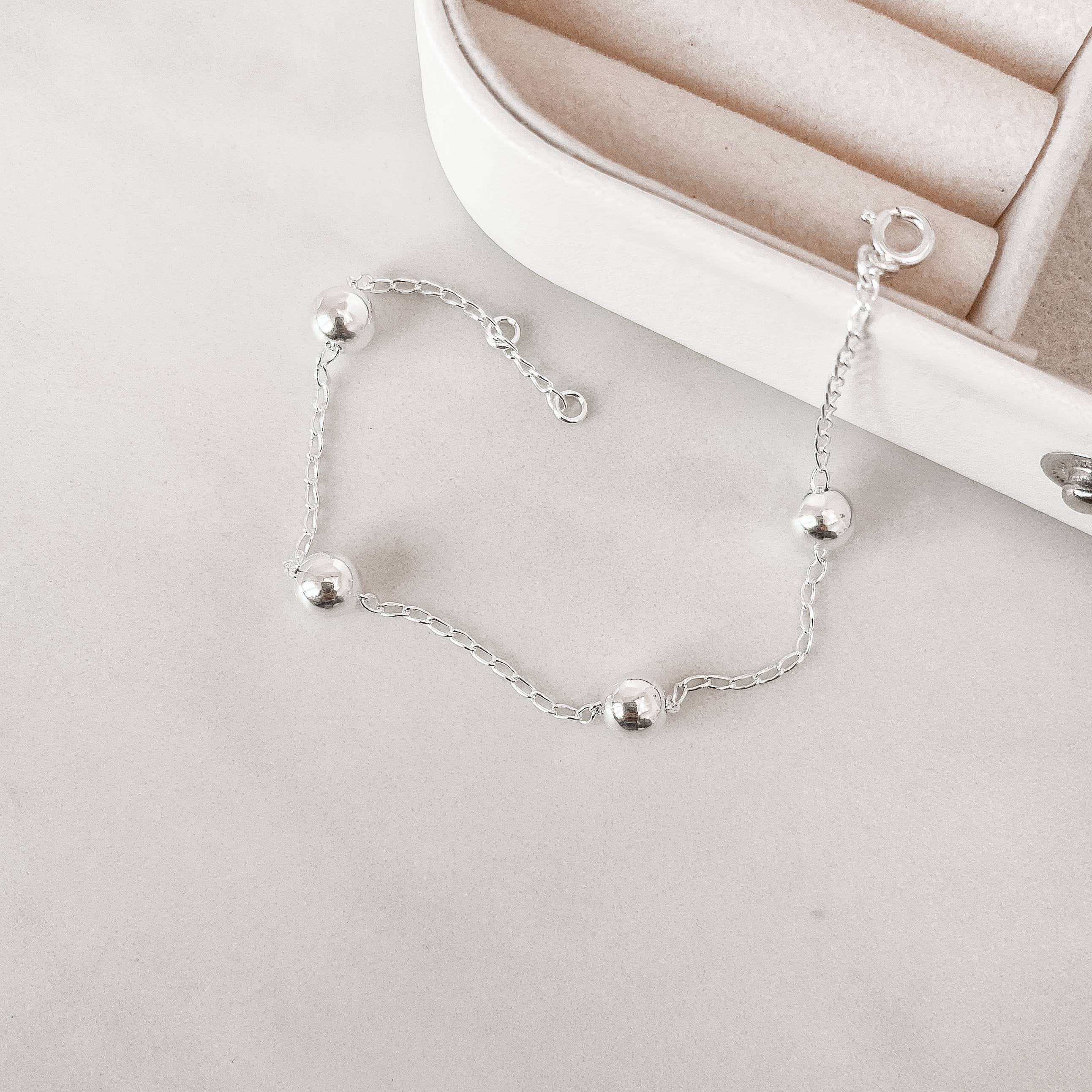 Imagem Secundária Pulseira bolas 7mm corrente cadeado