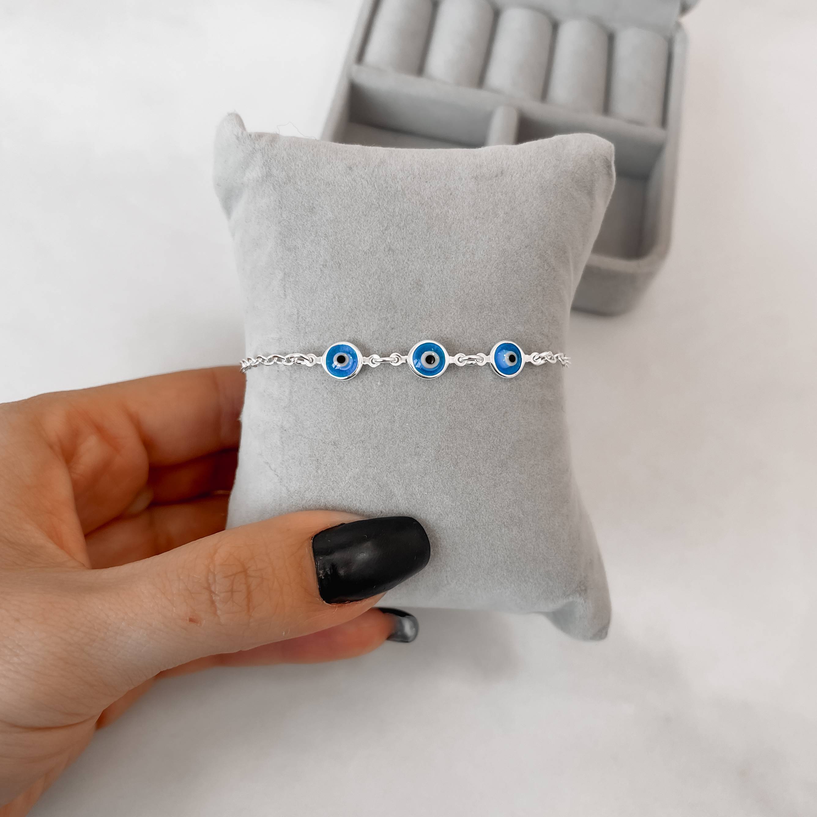 Pulseira entremeios olho grego azul 7mm