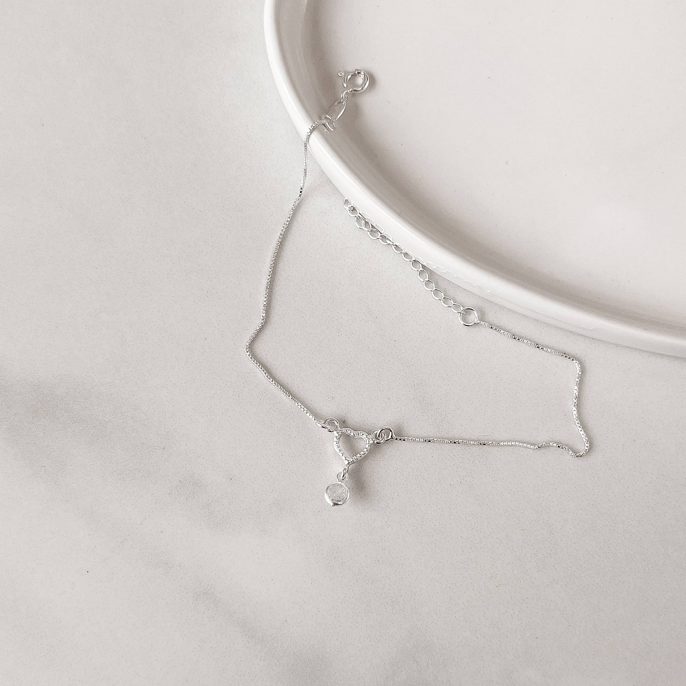 Imagem Secundária Pulseira entremeio coração vazado com zircônia 5mm