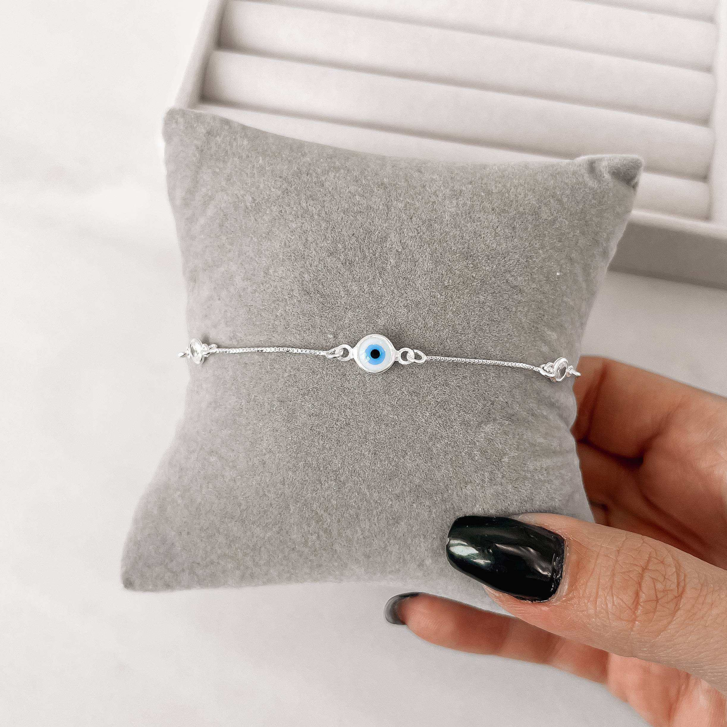 Imagem Secundária Pulseira entremeio olho grego e zircônias 5mm