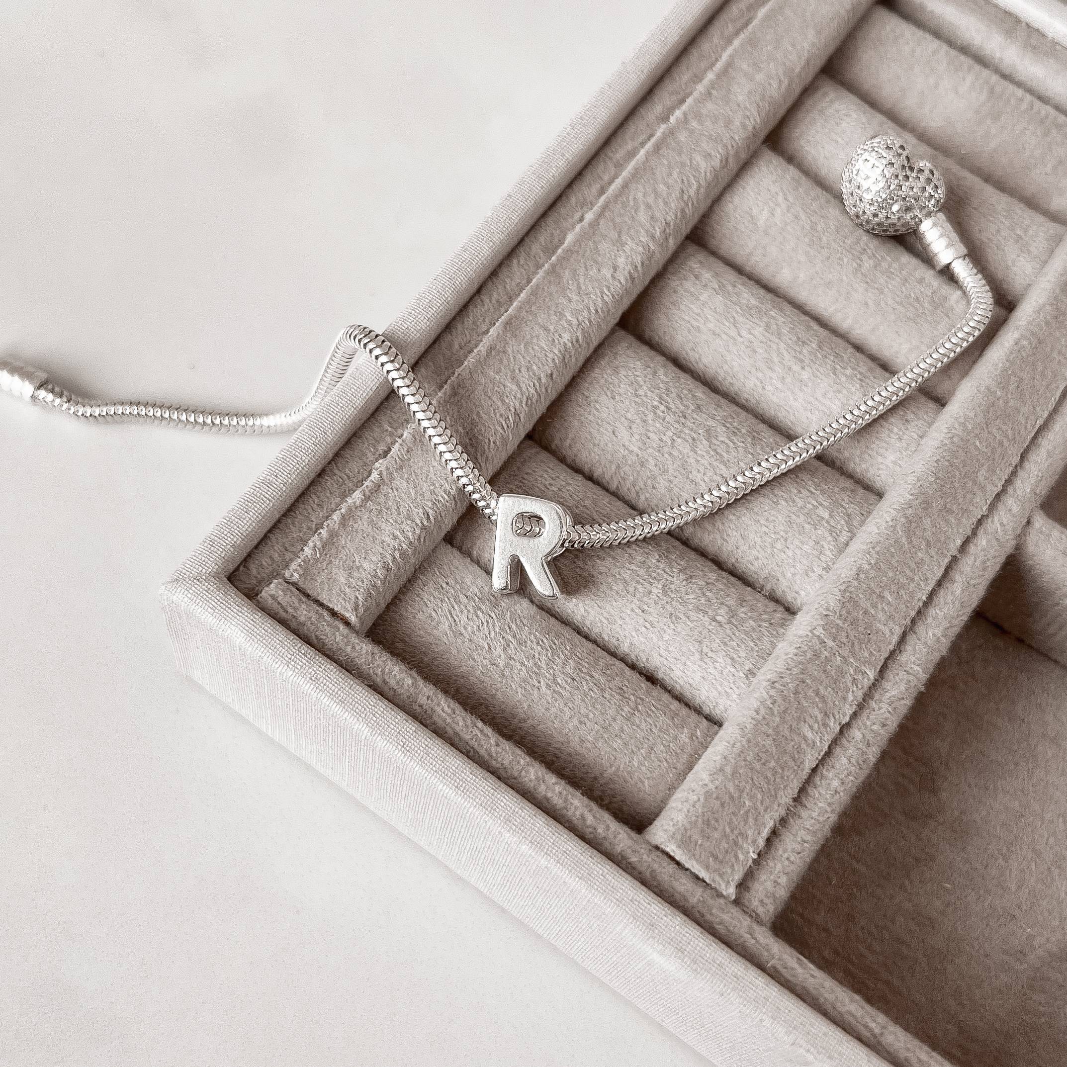 Imagem Secundária Berloque separador letra R 10mm