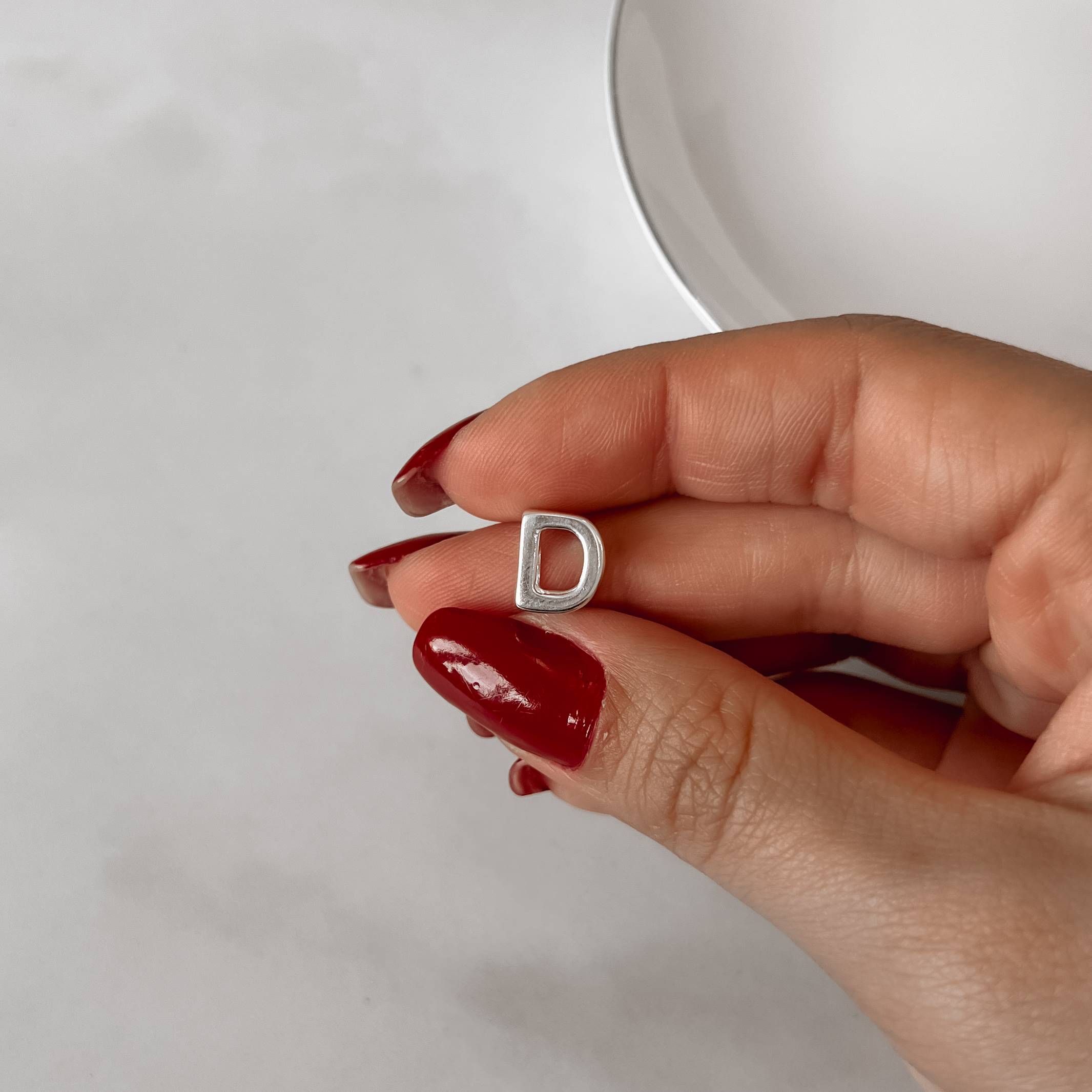 Imagem Secundária Berloque separador letra D 10mm