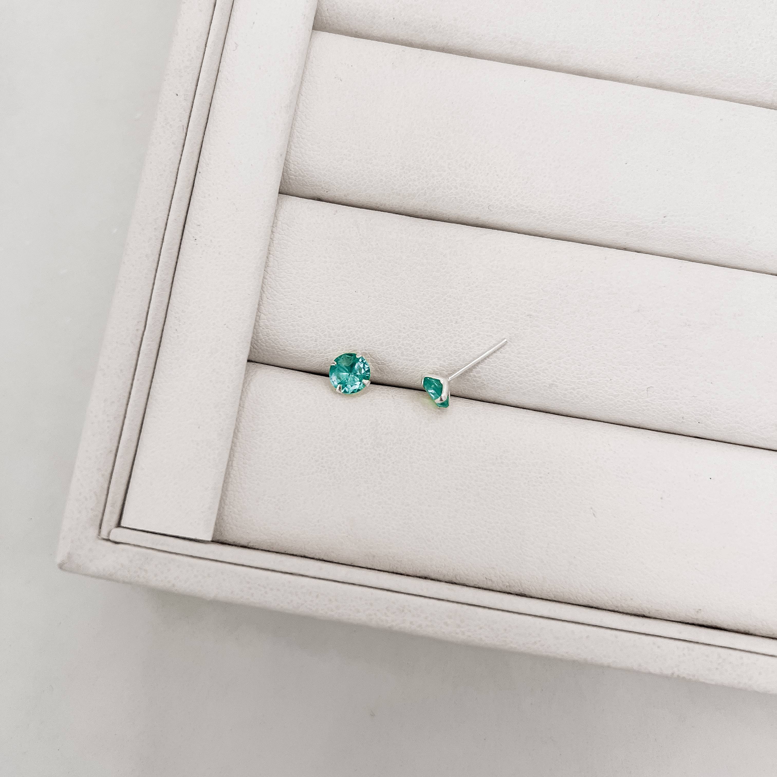 Brinco zircônia redonda acqua 6mm