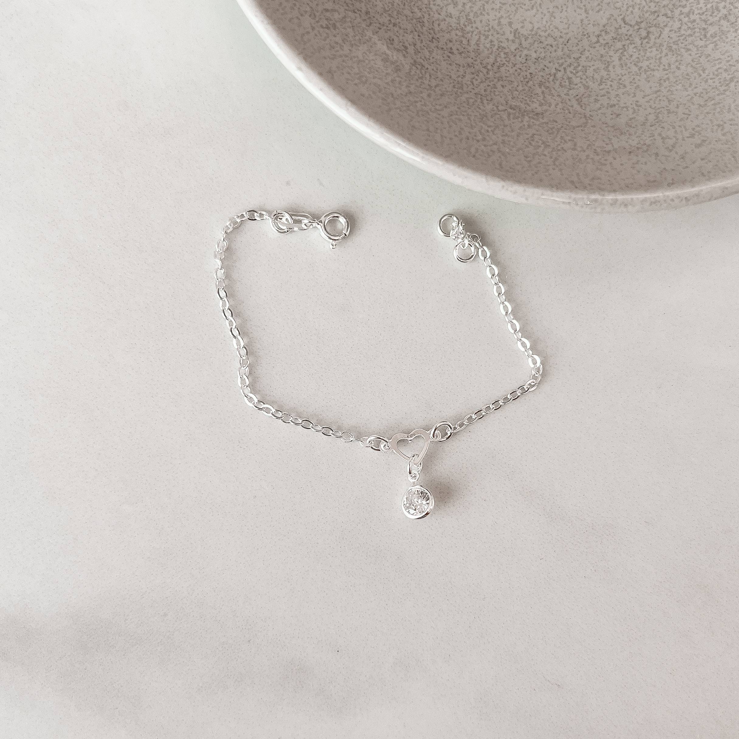 Imagem Secundária Pulseira infantil entremeio coração vazado com pingente zircônia 6mm