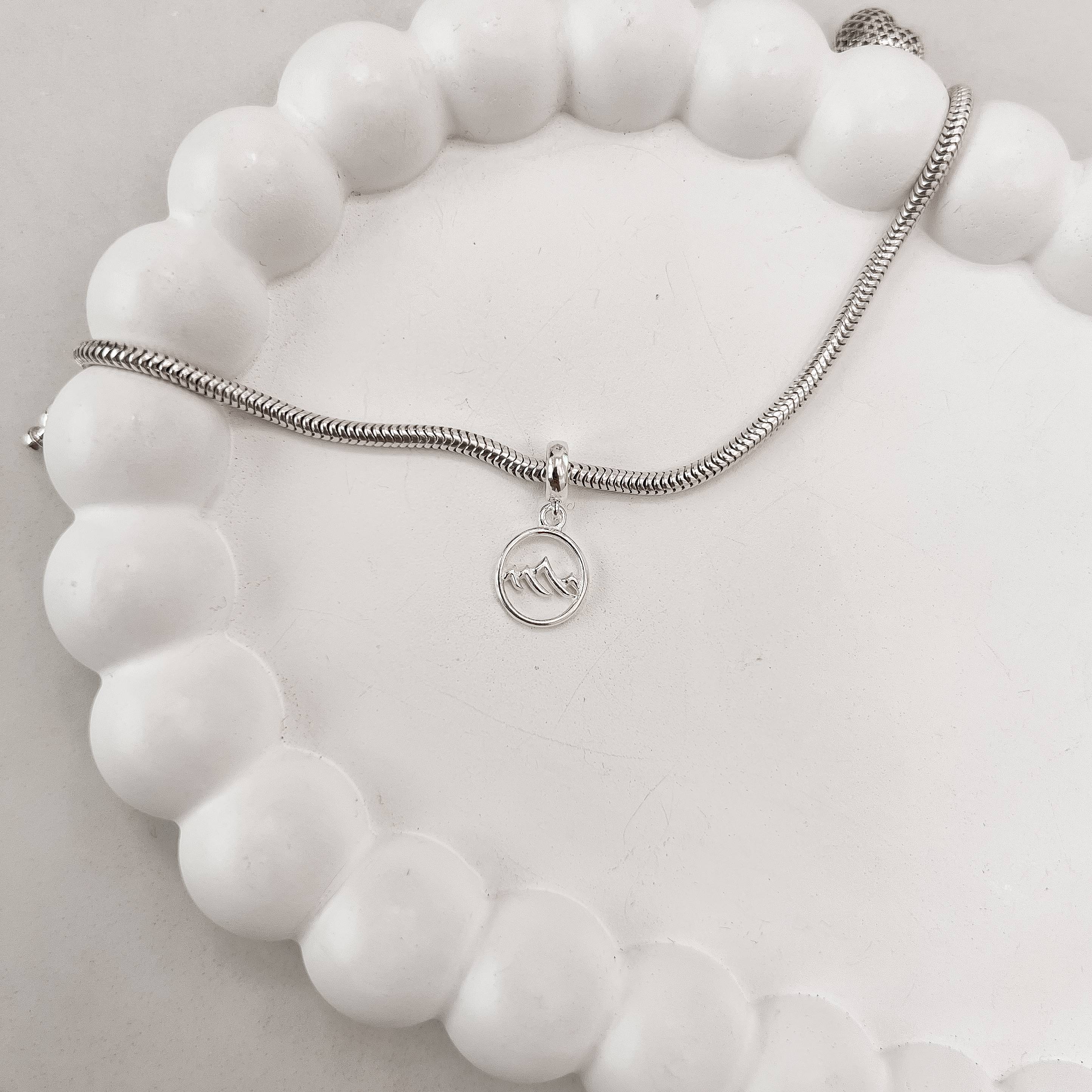 Imagem Secundária Berloque pingente medalha montanha 10mm