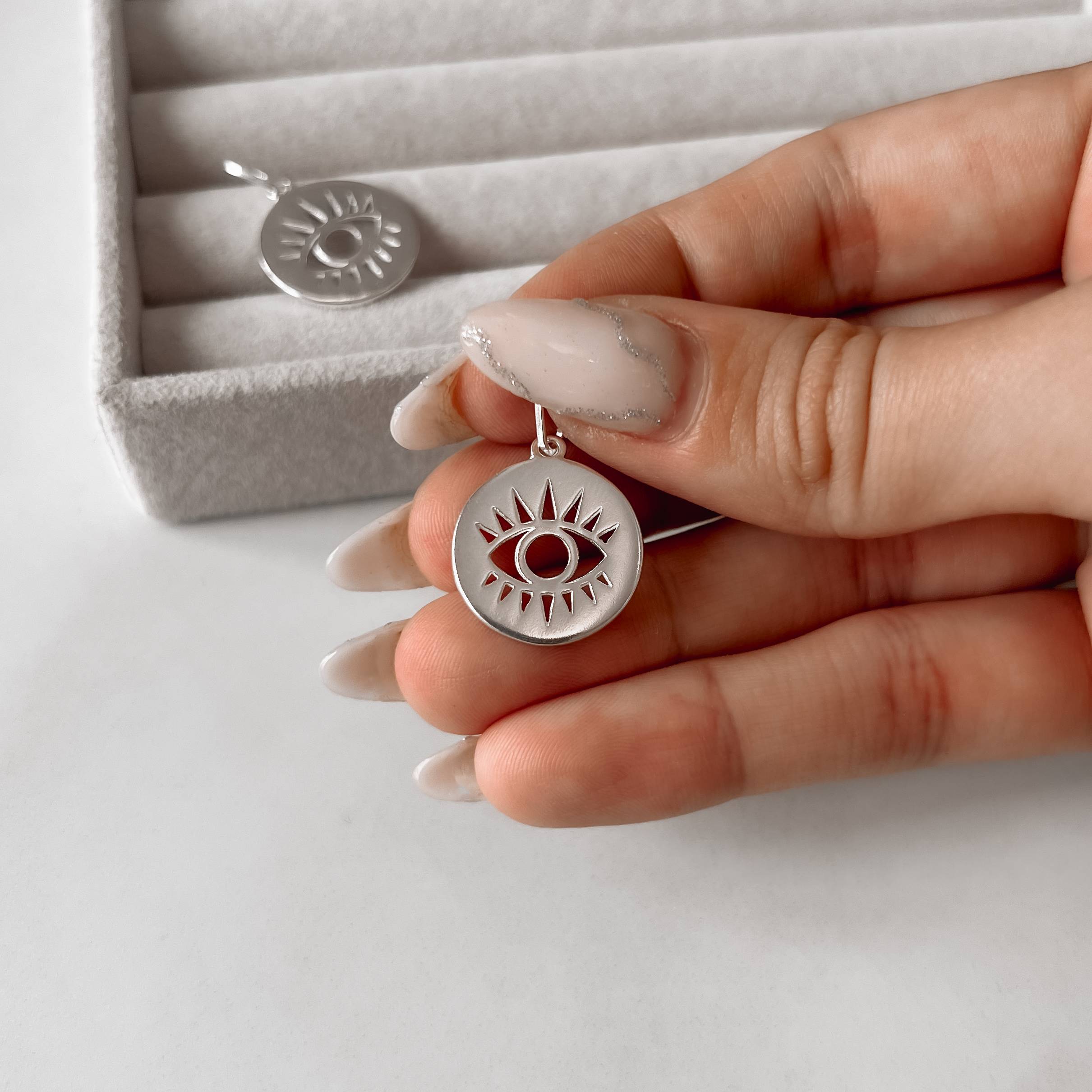 Imagem Secundária Pingente medalha olho 18mm