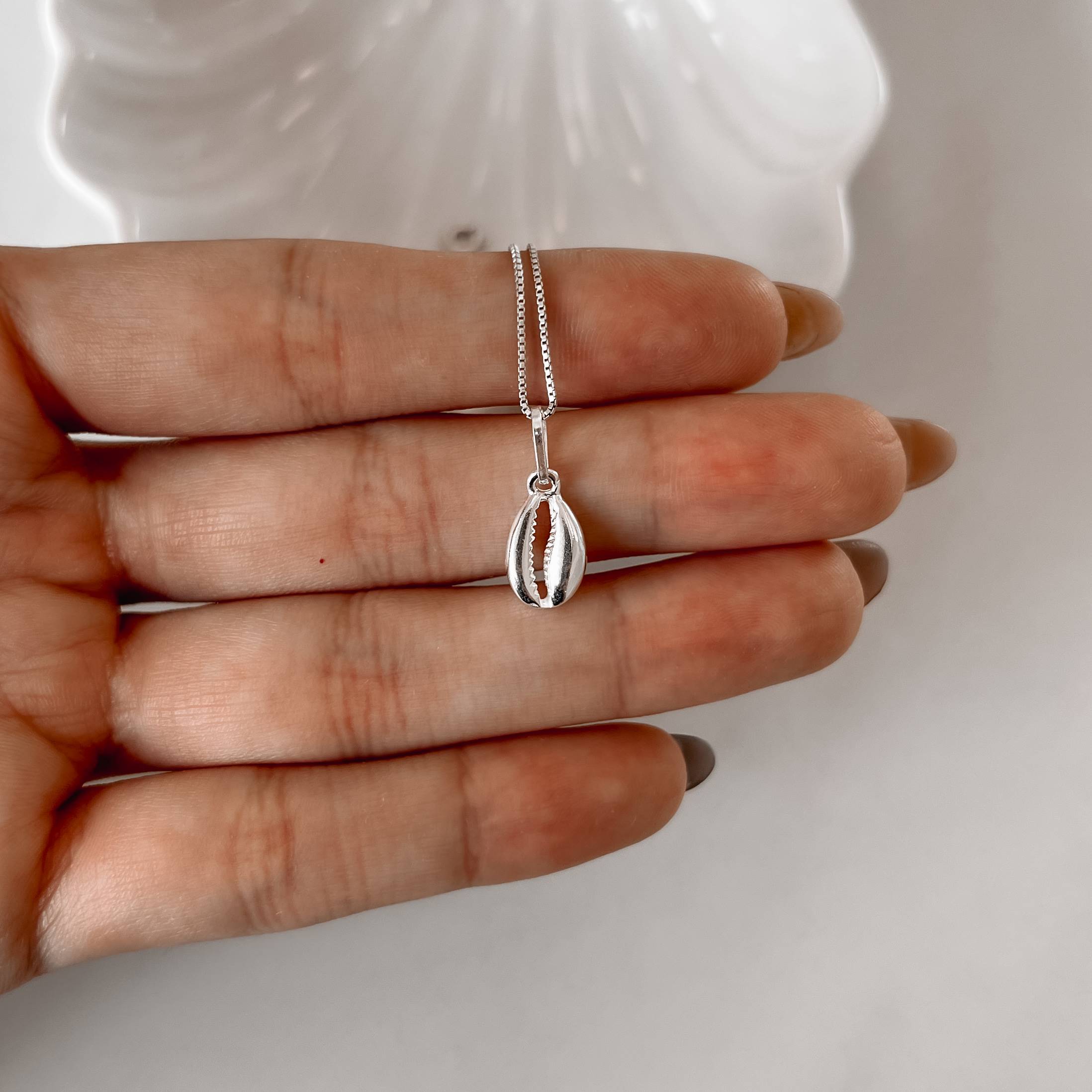 Imagem Secundária Colar pingente búzios 12mm 45cm