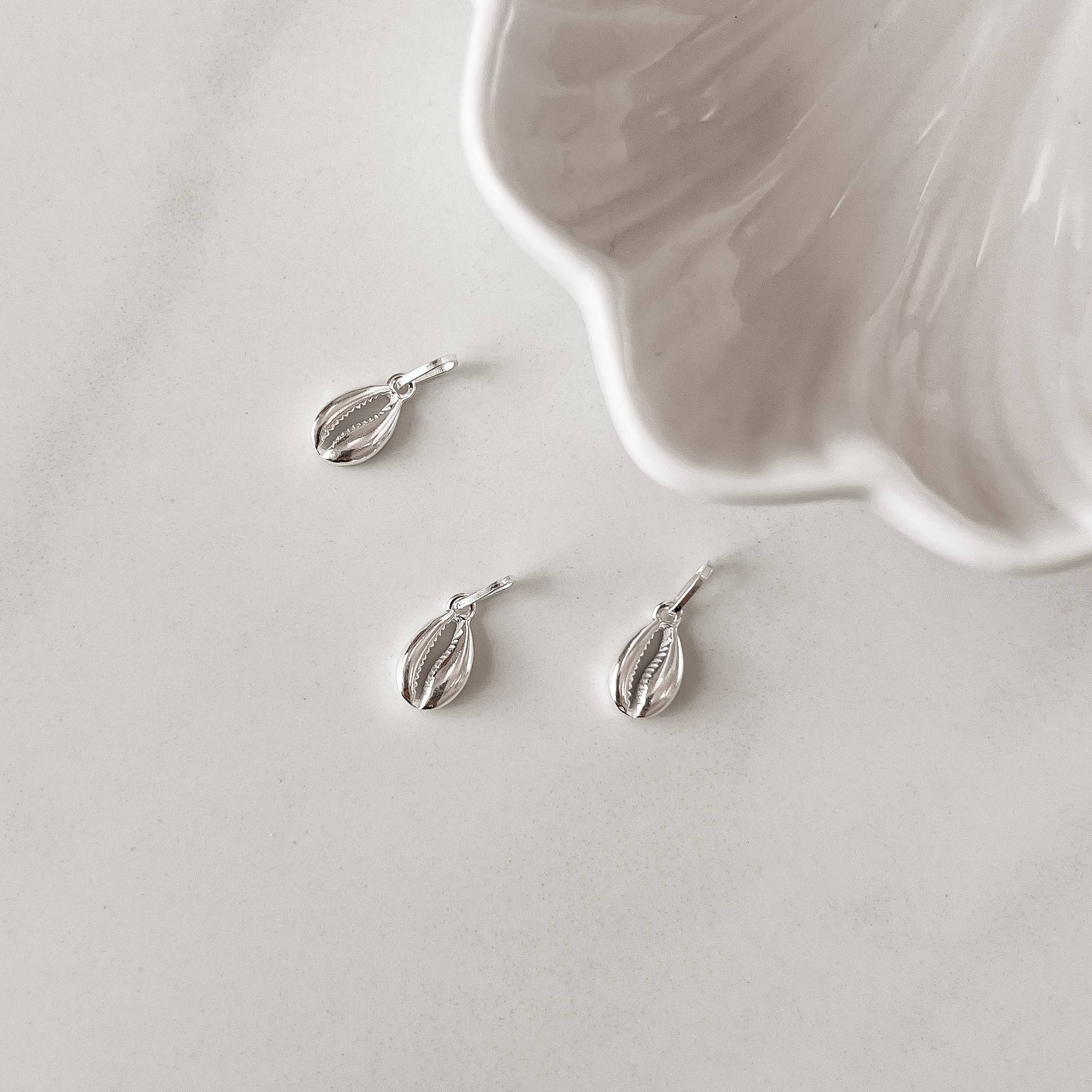 Pingente búzios 12mm