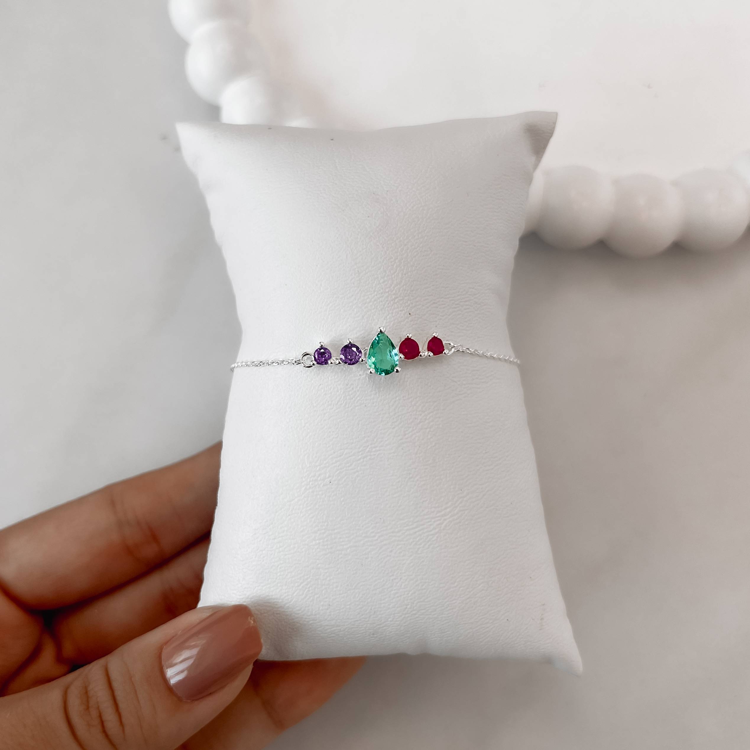 Imagem Secundária Pulseira entremeio zircônias gota acqua e redondas lilás e pink