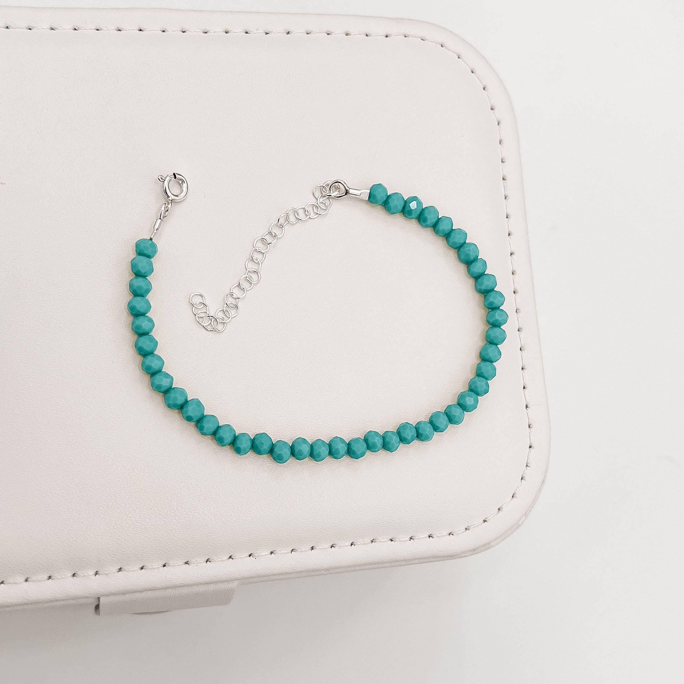 Imagem Secundária Pulseira cristal turquesa 4mm 16cm com alongadora