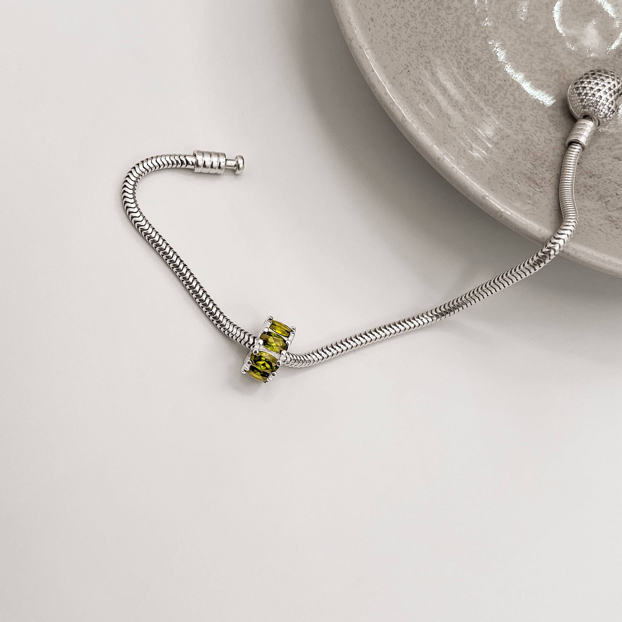 Imagem Secundária Berloque separador zircônias ovais verde 11mm