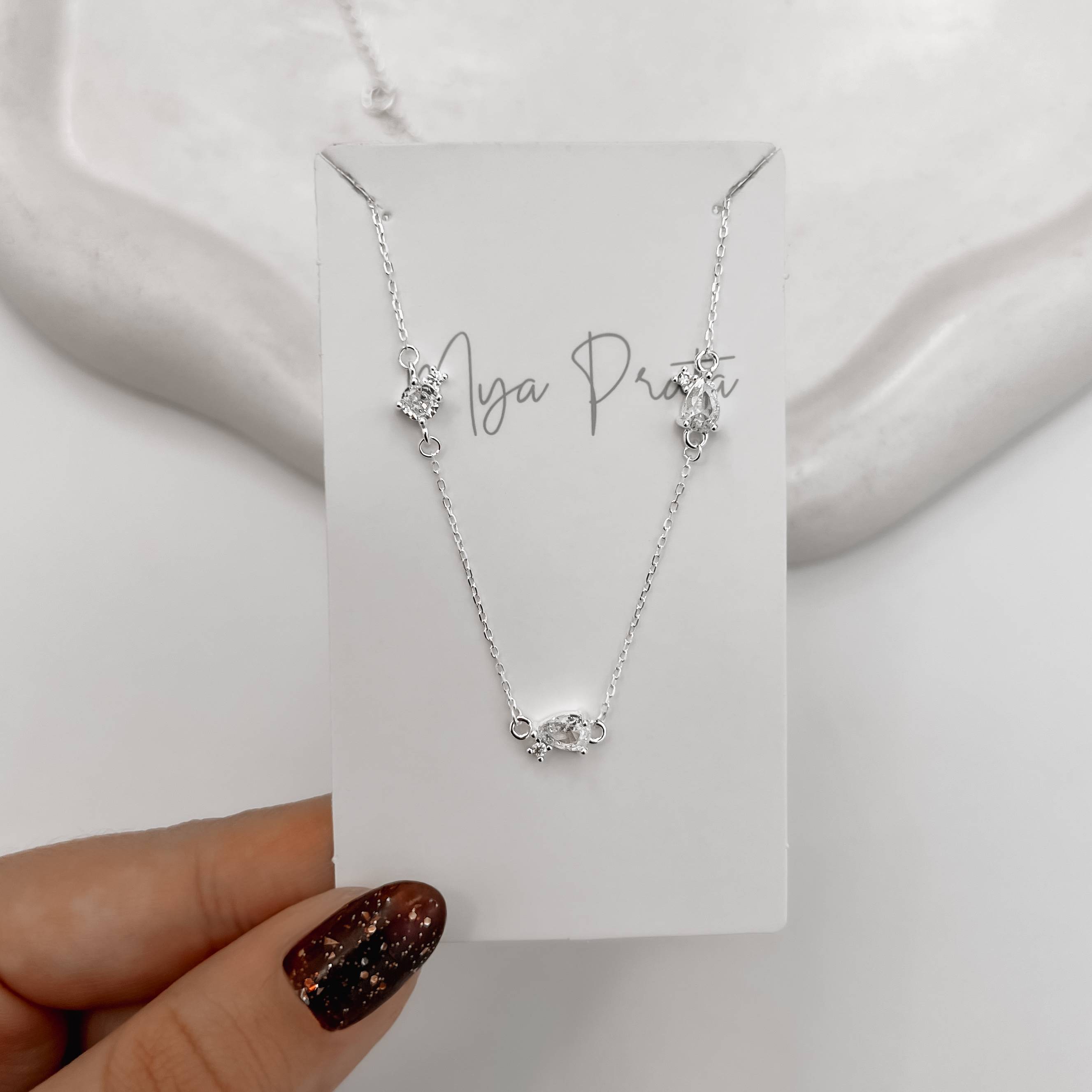 Imagem Secundária Colar entremeios zircônias gota e redonda 7mm 40+5cm