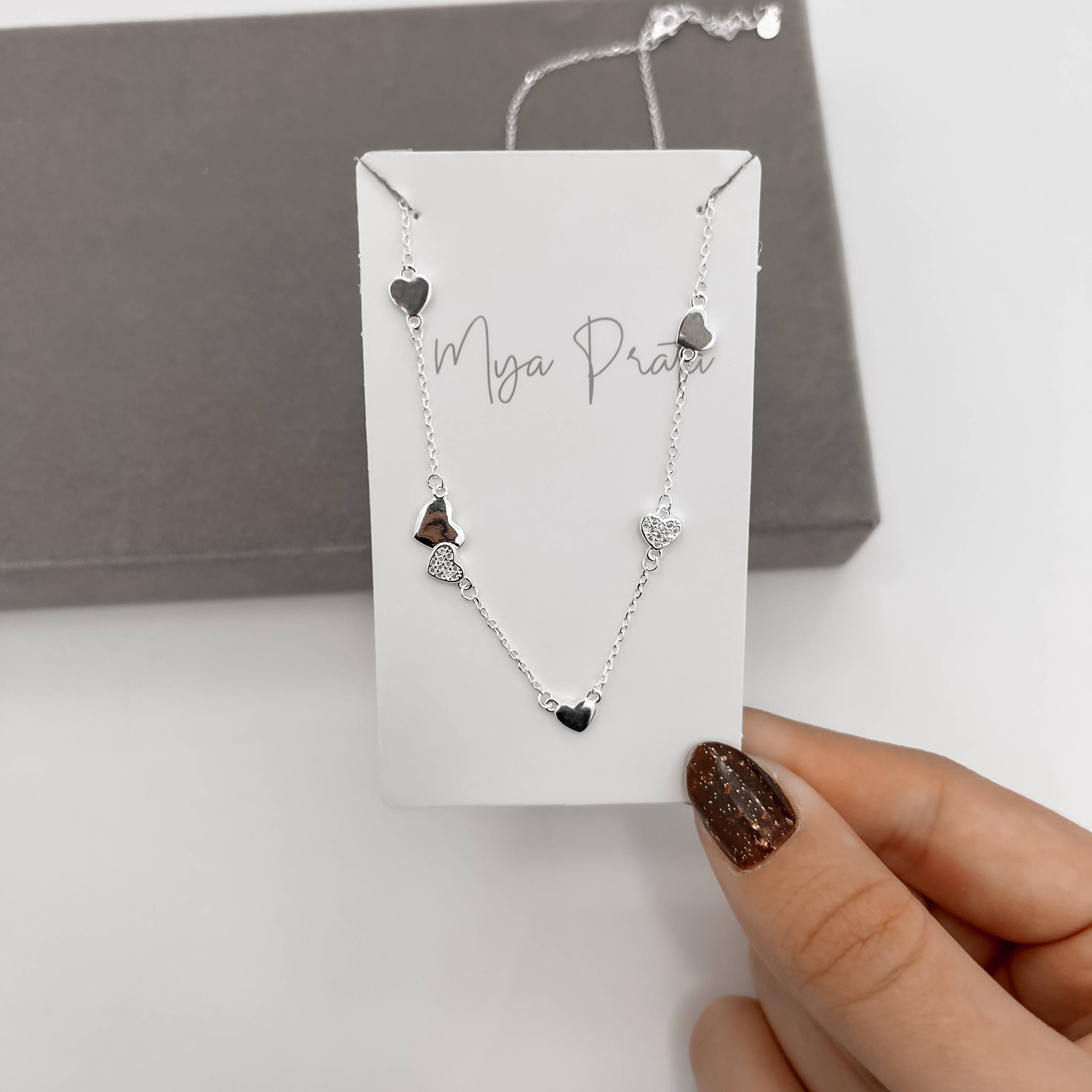 Imagem Secundária Colar entremeio corações lisos e cravejados 40+5cm