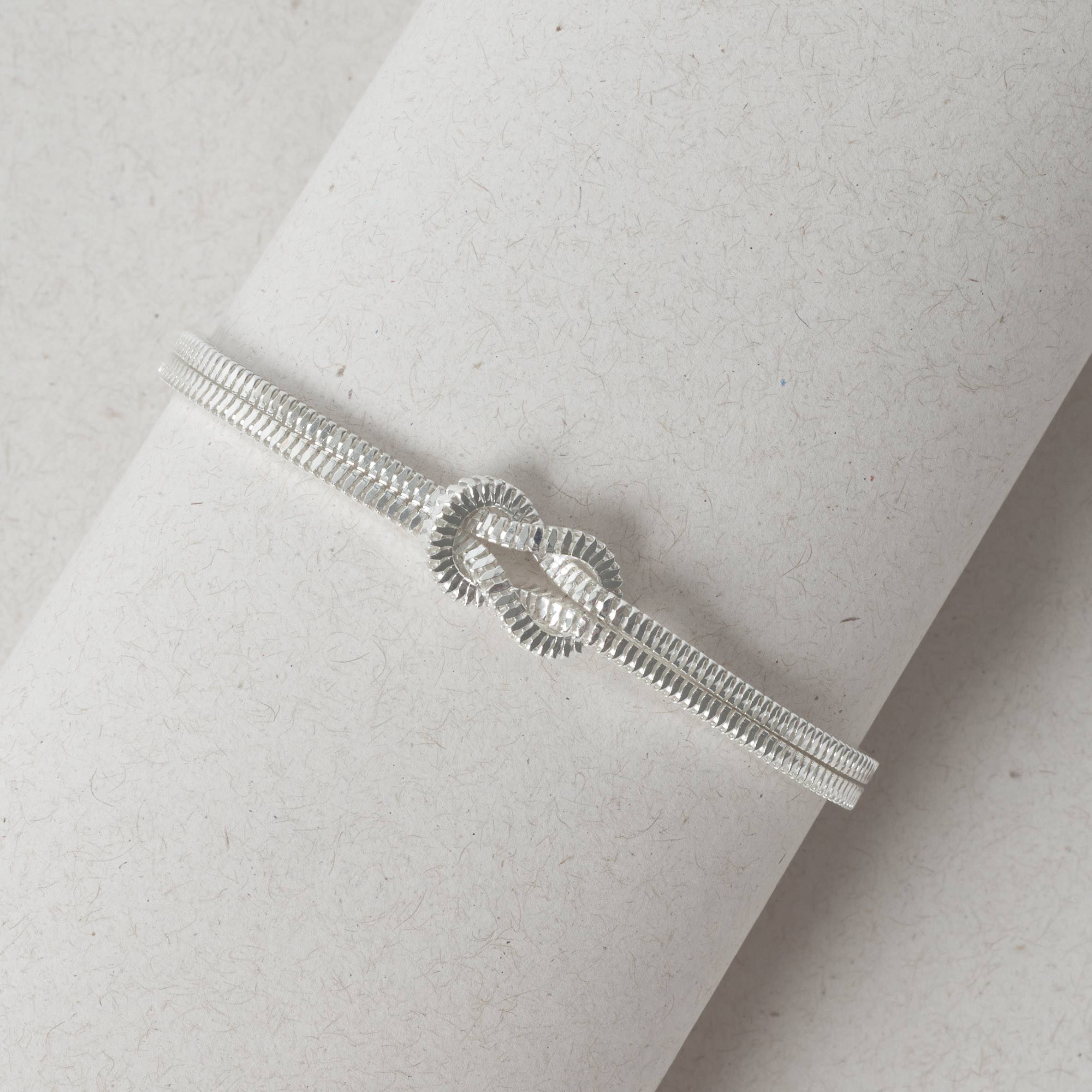 Imagem Secundária Pulseira corrente dupla com nó 19cm