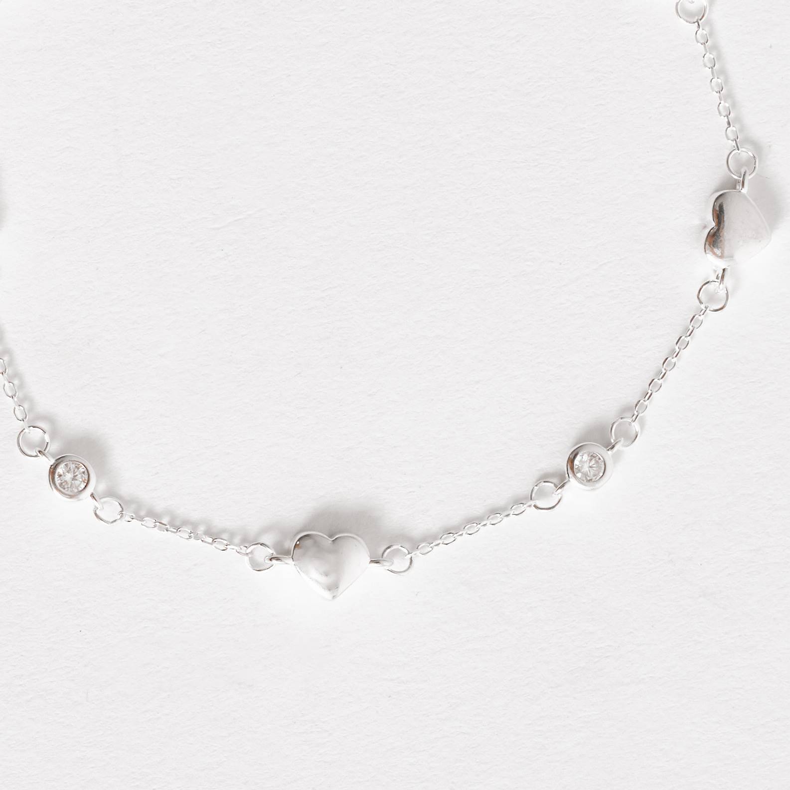 Imagem Pulseira entremeios zircônia e coração 16+5cm