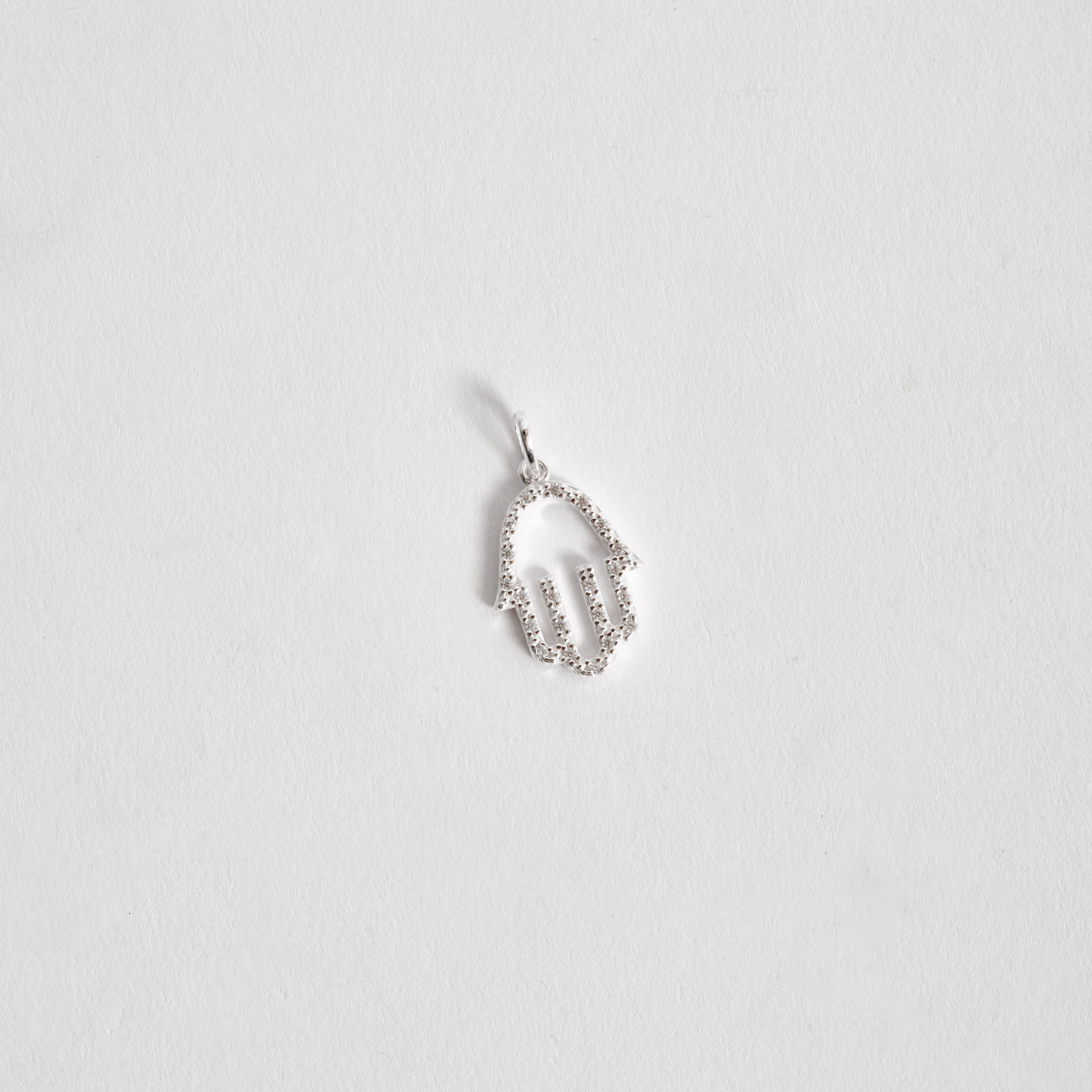 Imagem Pingente mão vazada cravejada 19mm