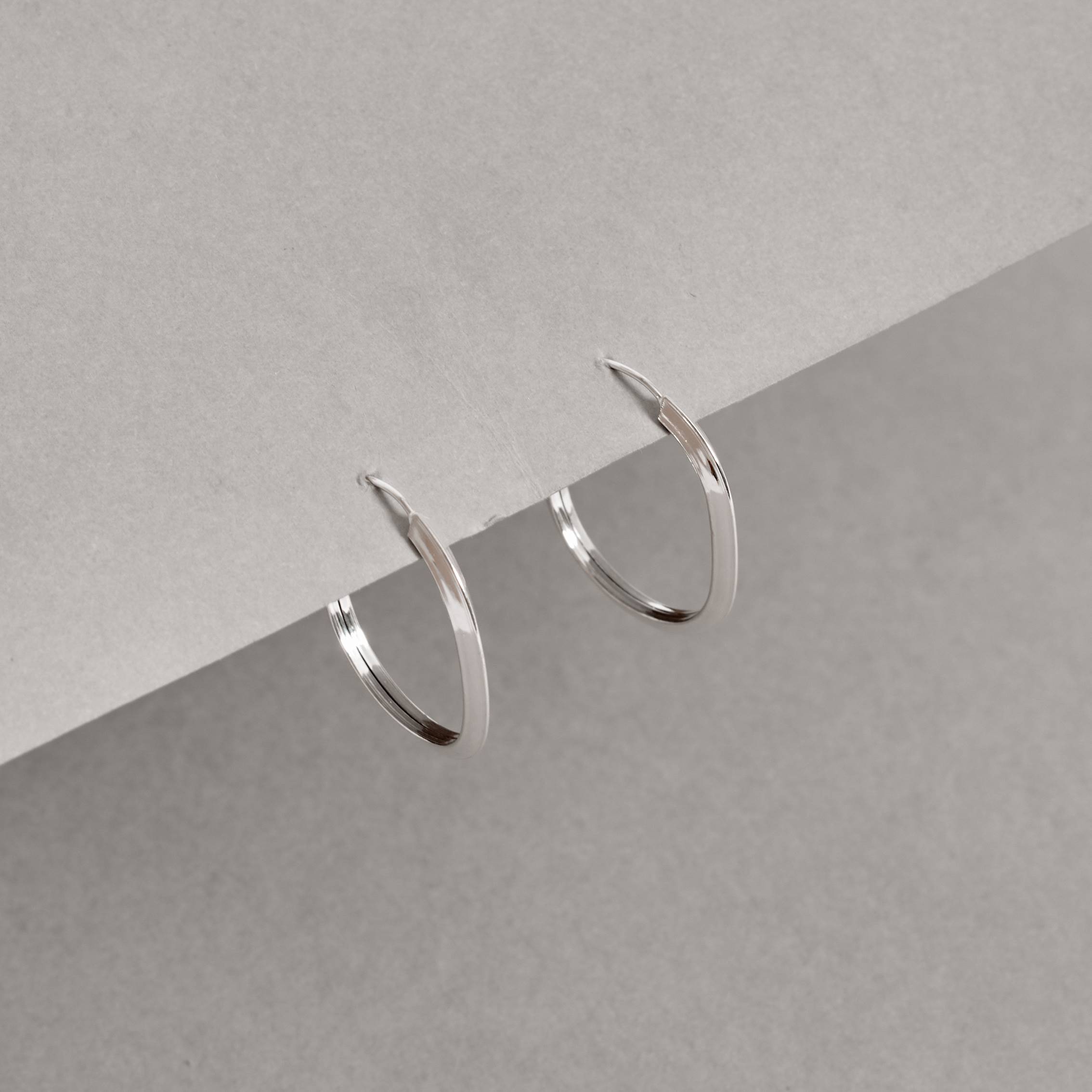 Imagem Secundária Argola oval 25x21mm fio triângulo