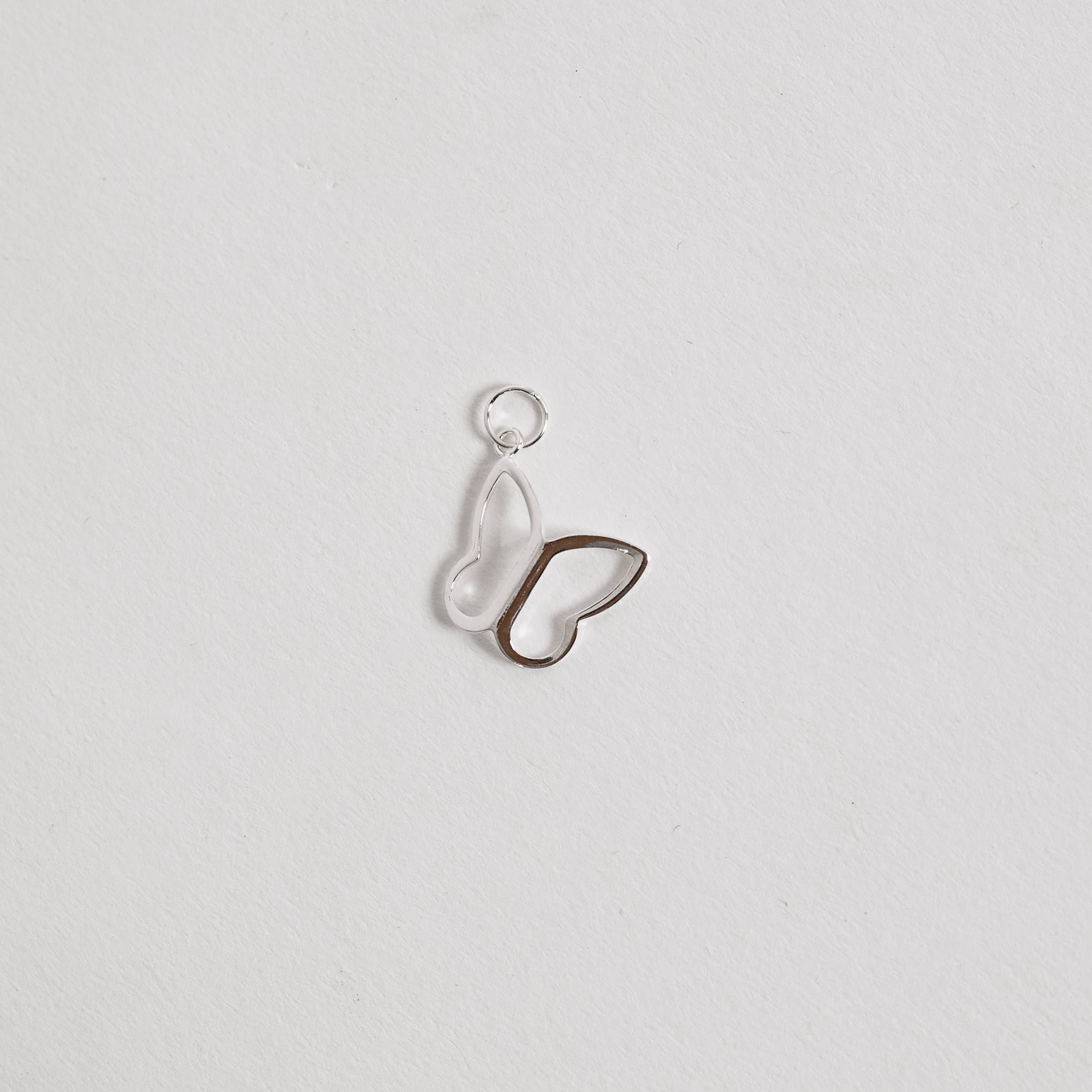 Imagem Secundária Pingente borboleta vazada de lado 15mm