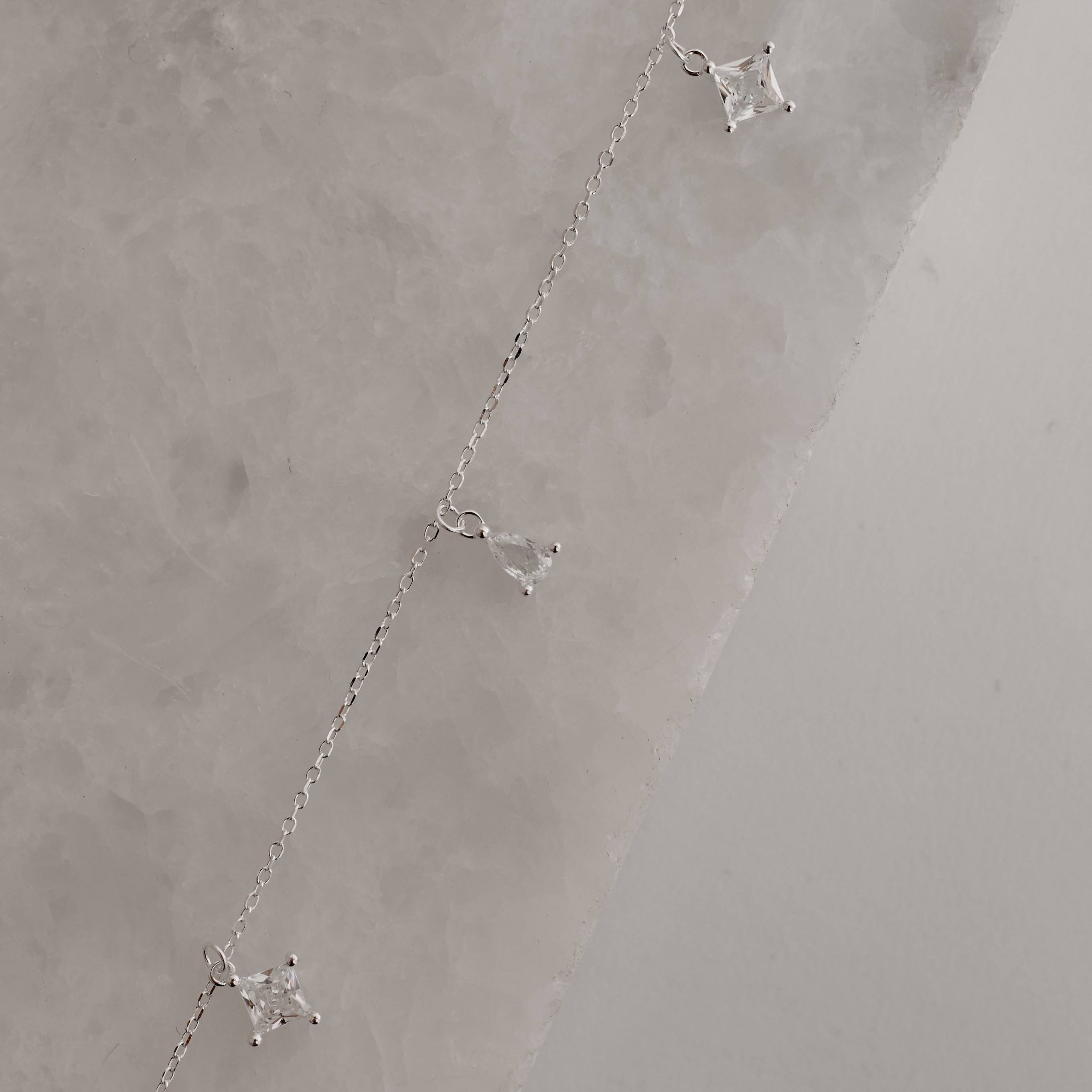 Imagem Secundária Pulseira pingentes zircônias losango e gota 6mm 16+4cm