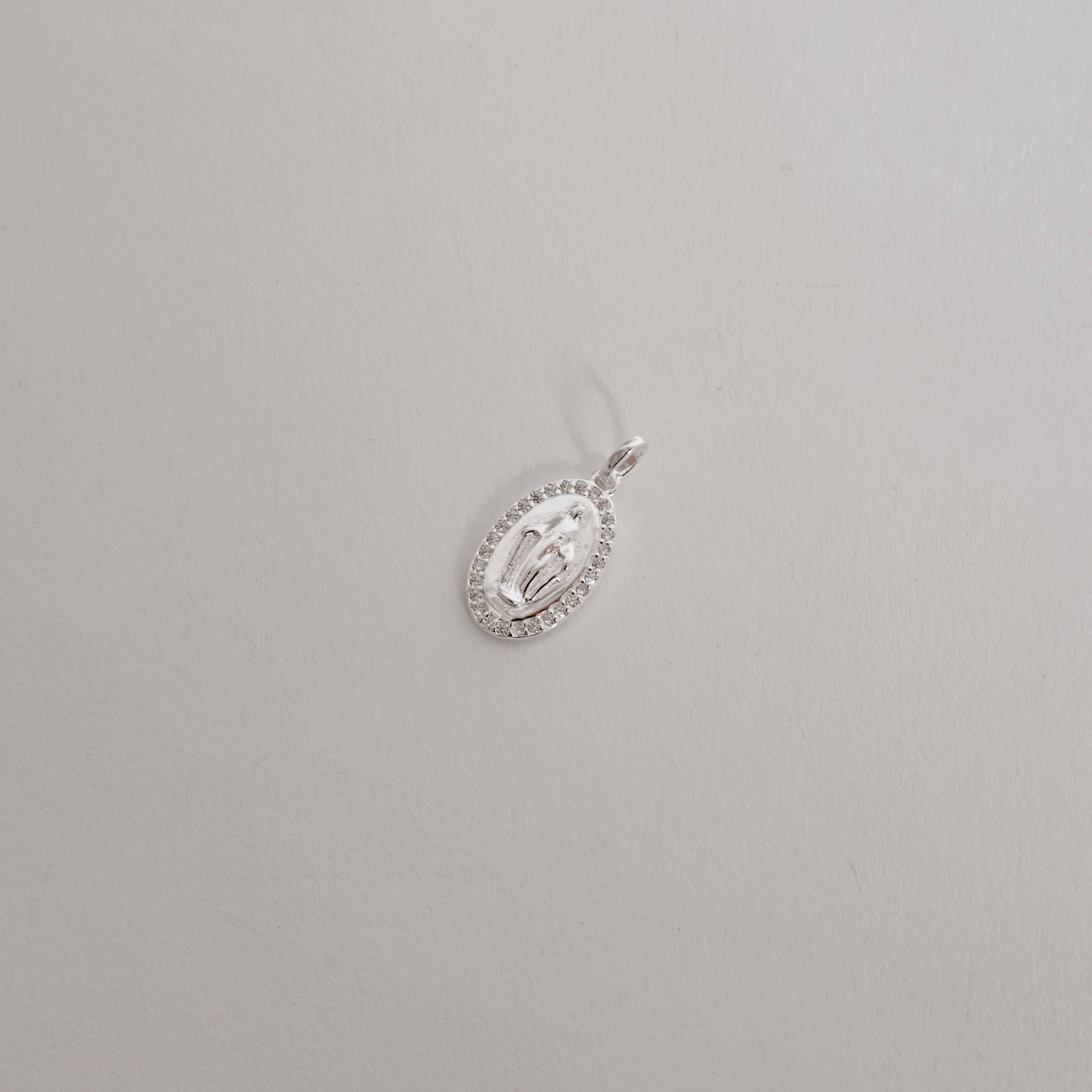 Imagem Secundária Pingente medalha oval Nsa. Sra. das Graças com cravejado 16mm 