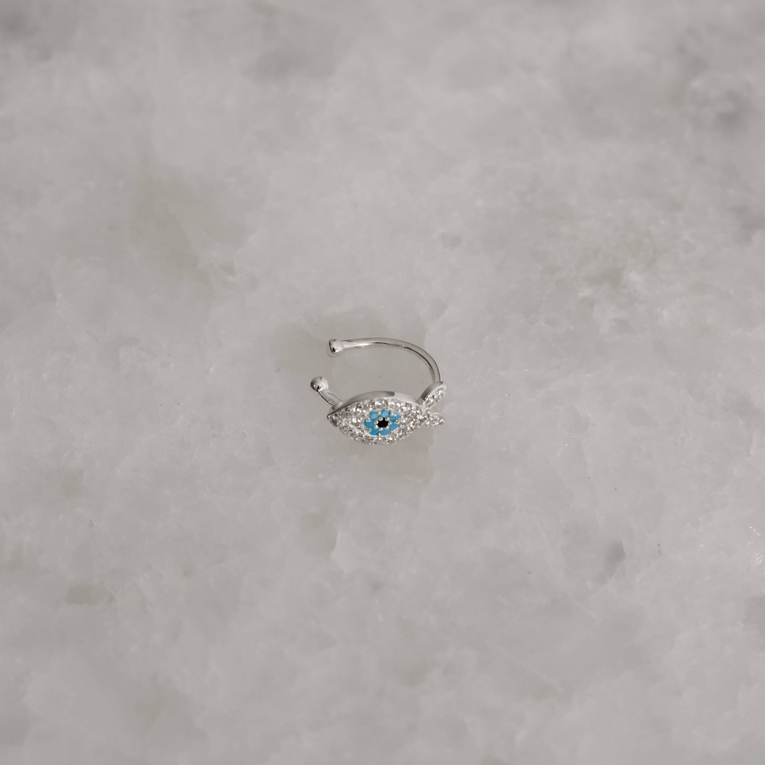 Imagem Secundária Piercing fake olho cravejado