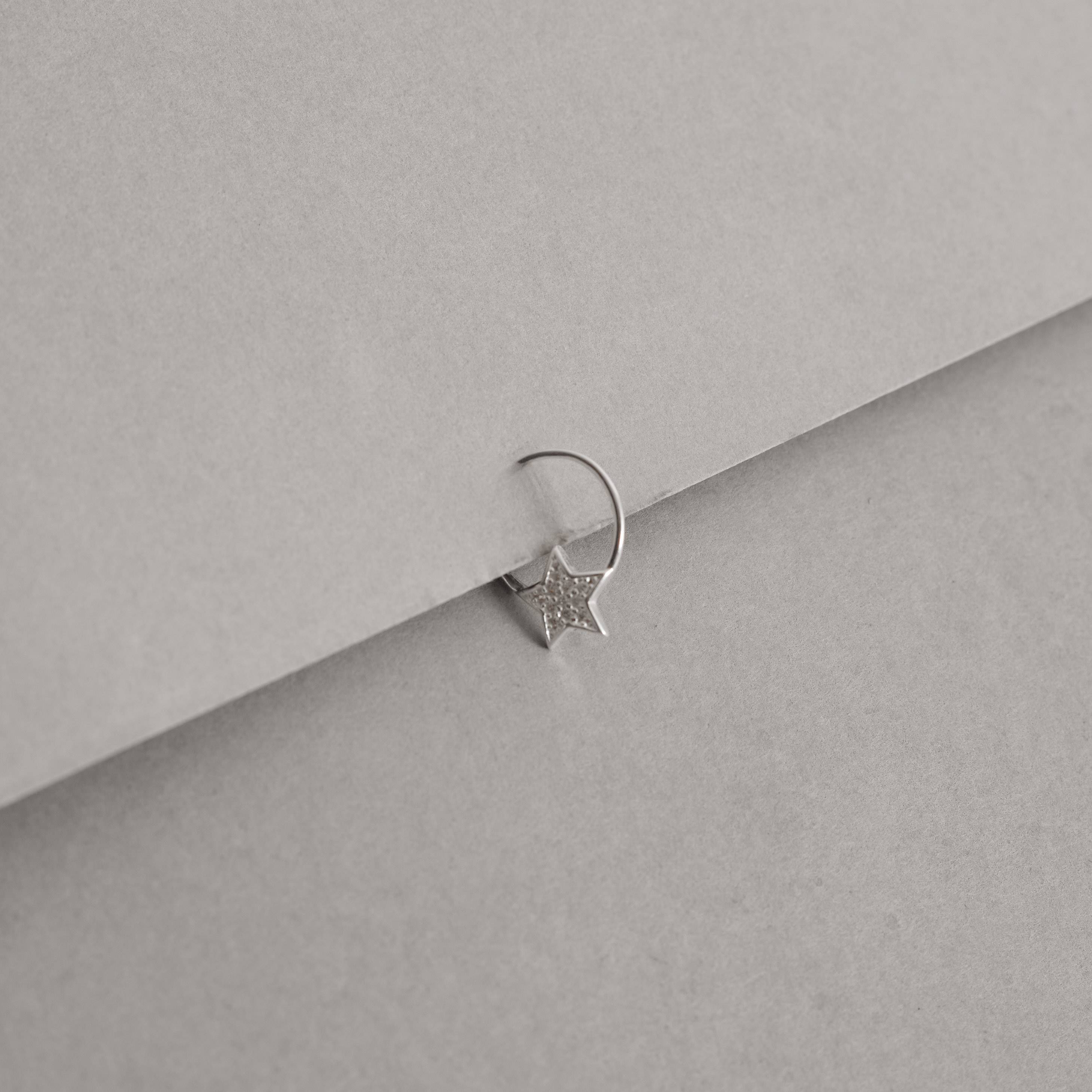 Imagem Secundária Piercing argola com estrela cravejada 11mm