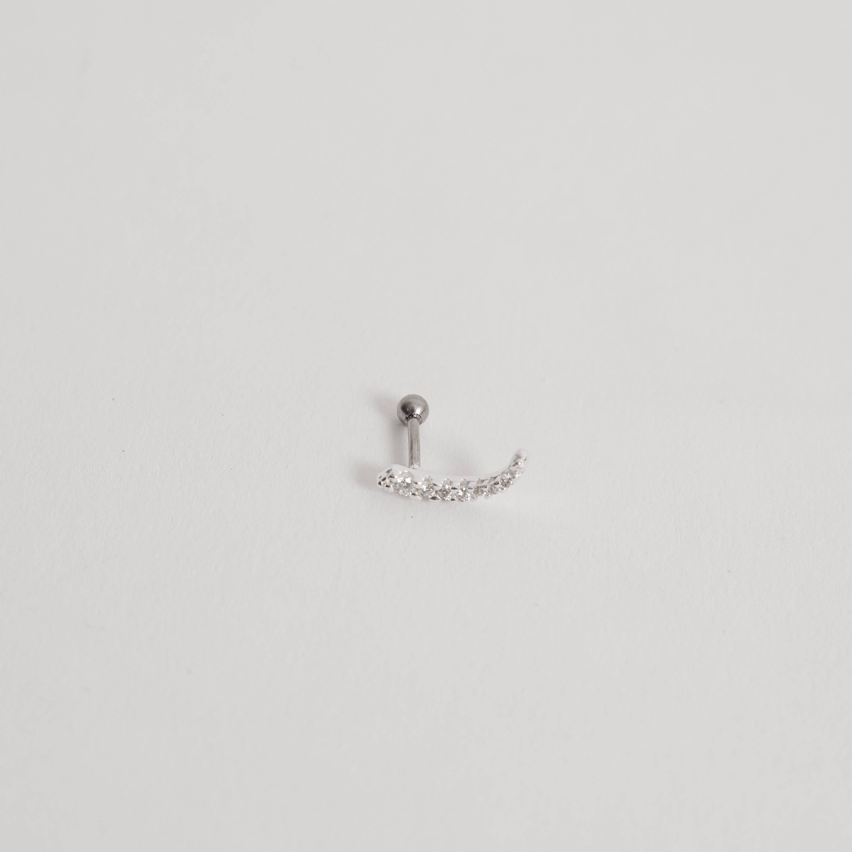 Imagem Secundária Piercing haste vírgula cravejada 14mm orelha direita