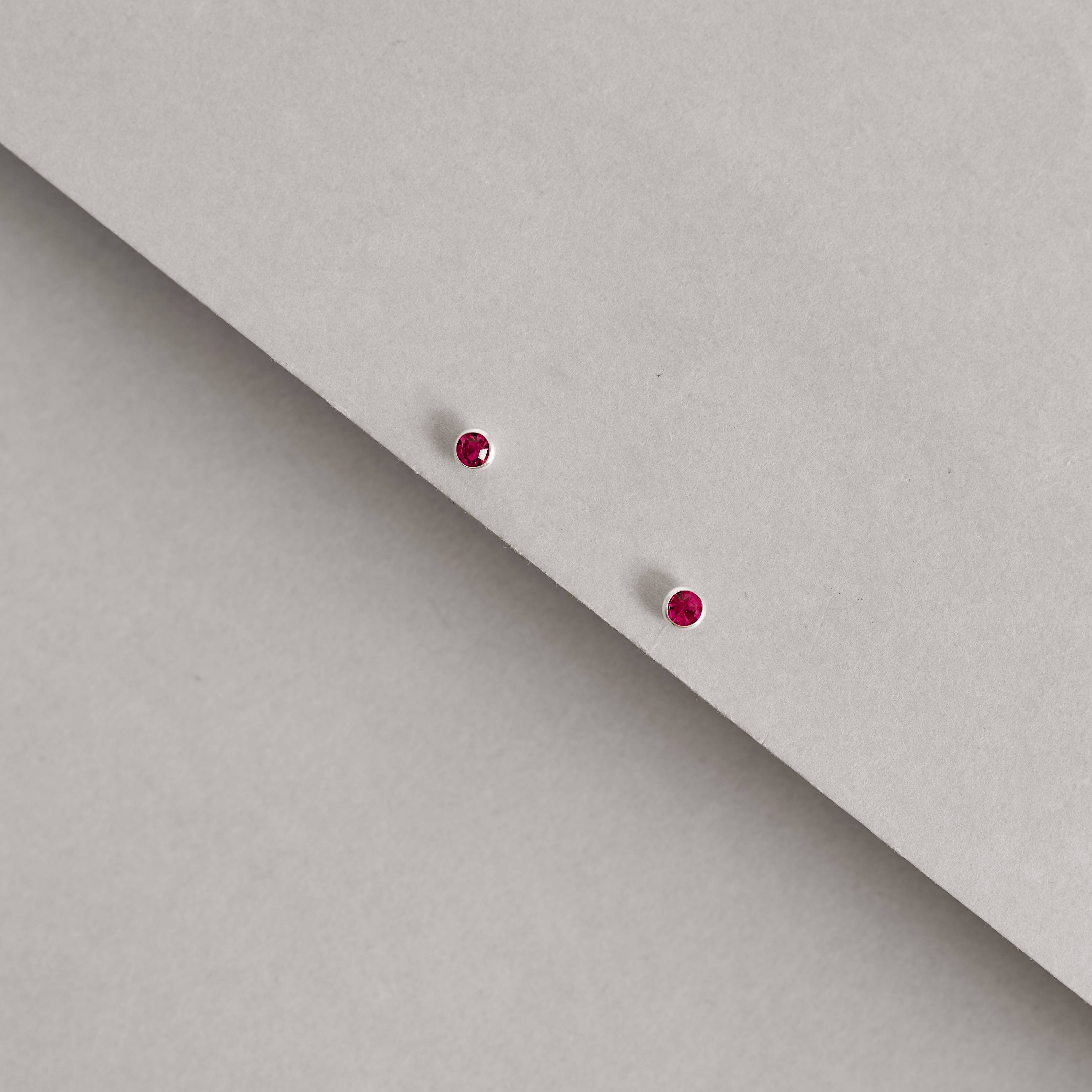 Imagem Secundária Brinco zircônia 3mm magenta tarraxa baby - CI