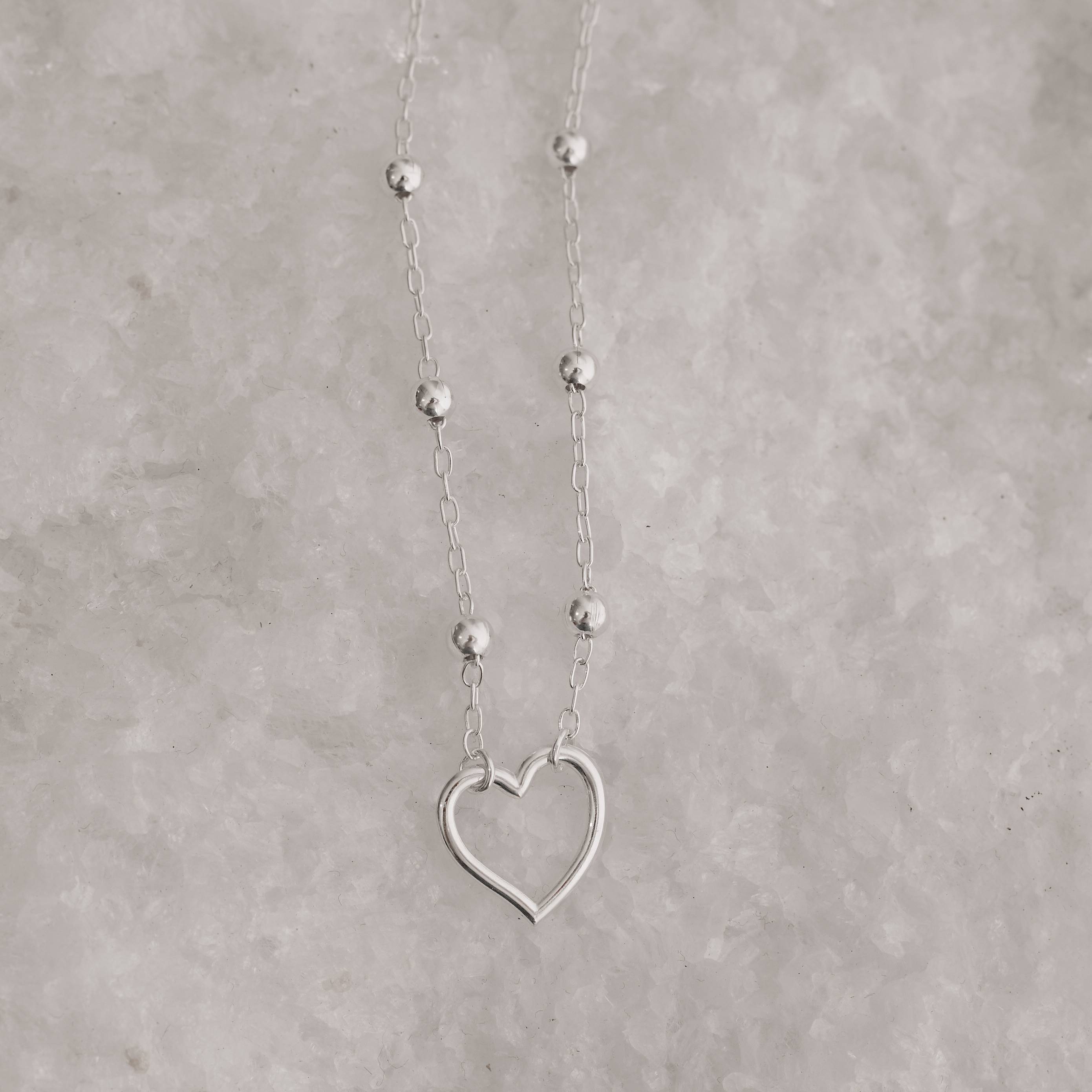 Imagem Secundária Choker entremeio bolas e coração vazado 14mm com extensor