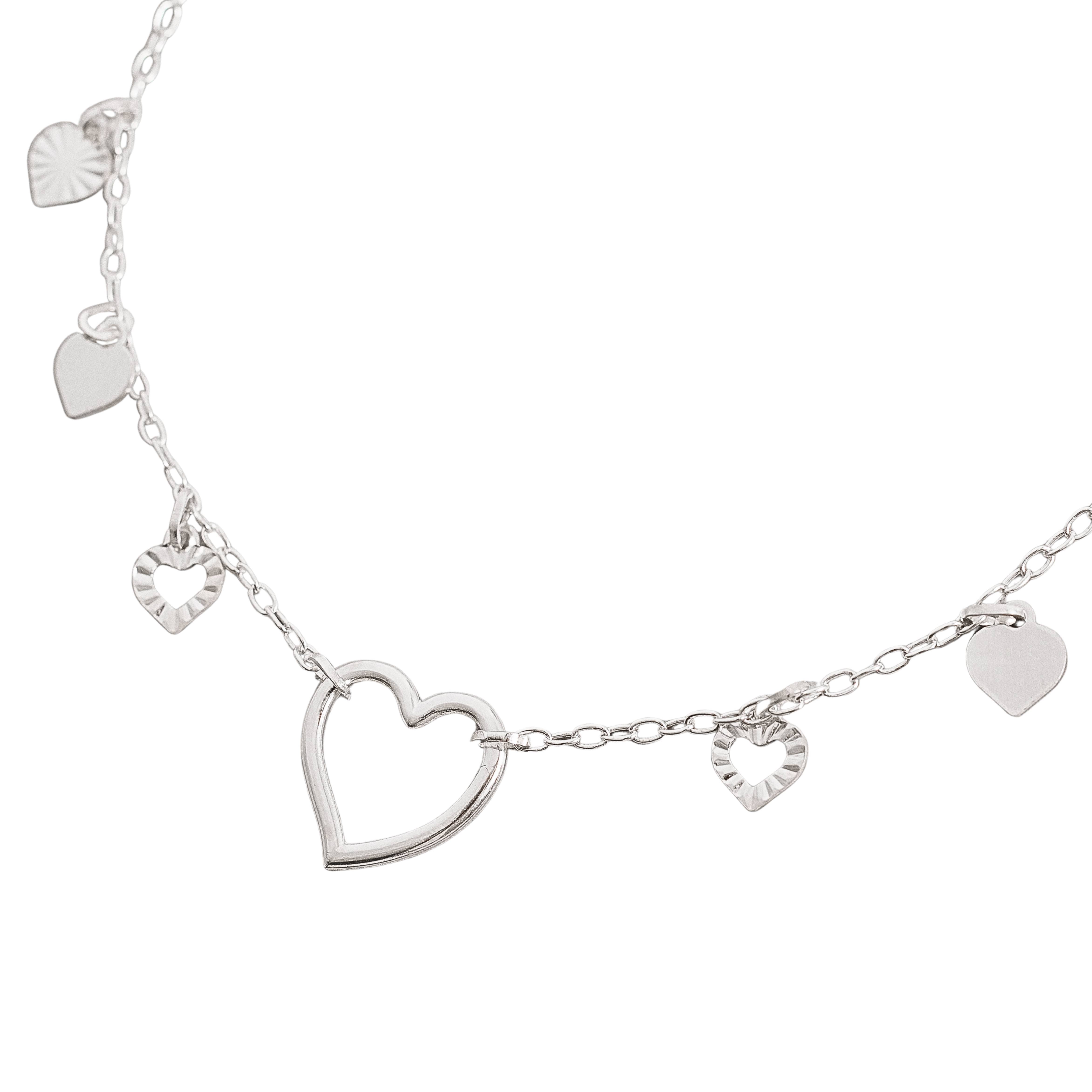 Imagem Pulseira entremeio coração vazado pingentes corações liso e vazado com vinco