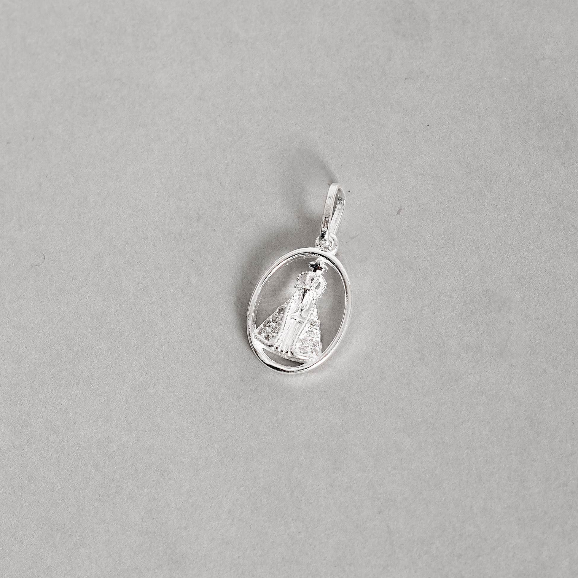 Imagem Secundária Pingente medalha Nsa. Sra. Aparecida cravejada 14mm