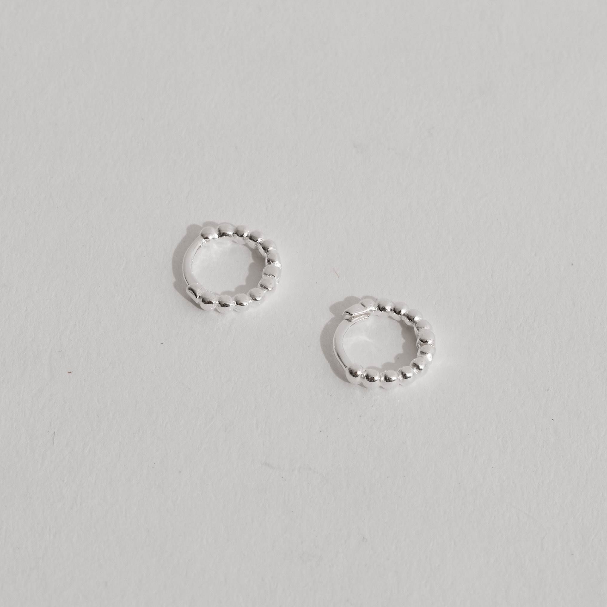 Imagem Argola click redonda 9mm fio bolinhas