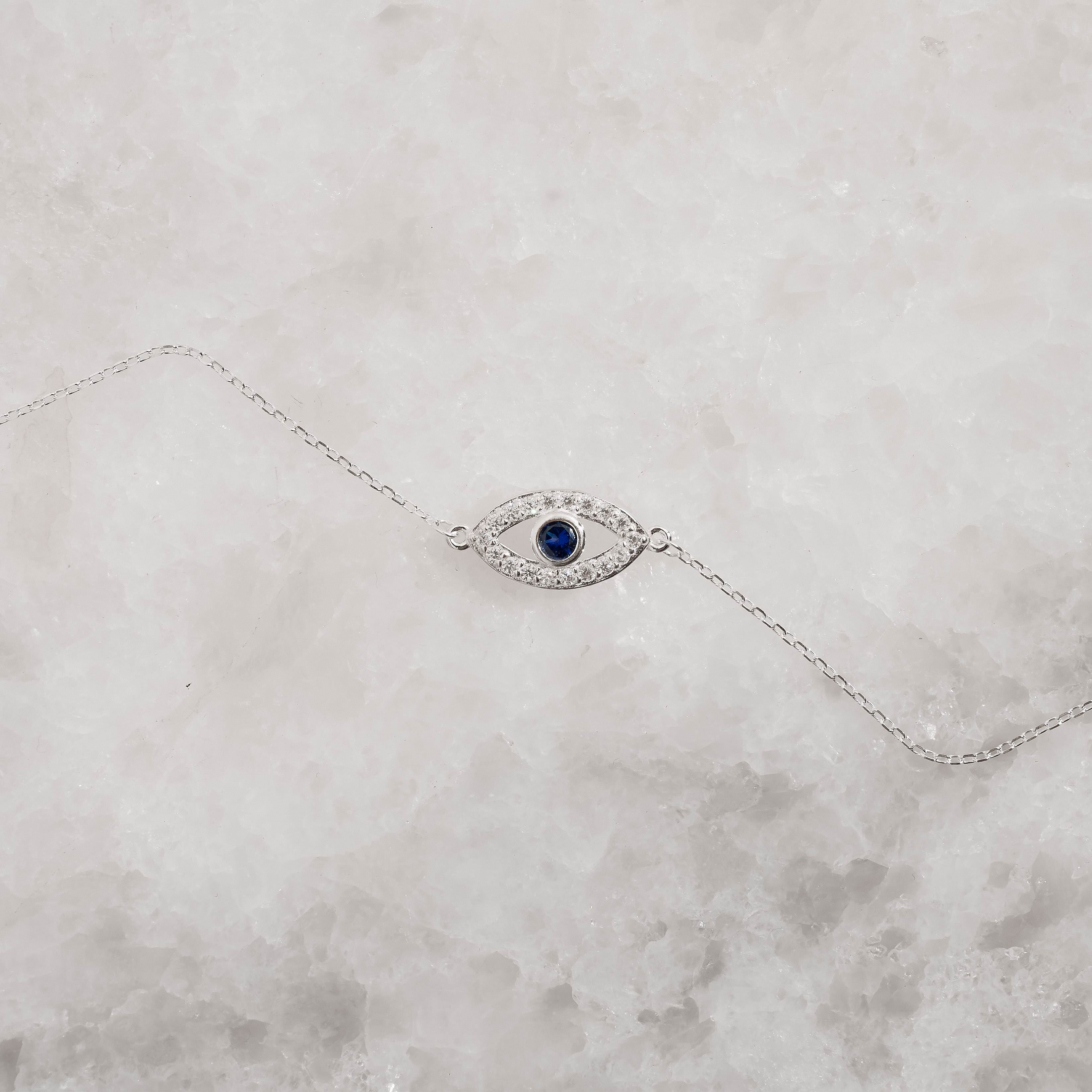 Imagem Secundária Pulseira entremeio olho grego cravejado detalhe zircônia azul 16mm
