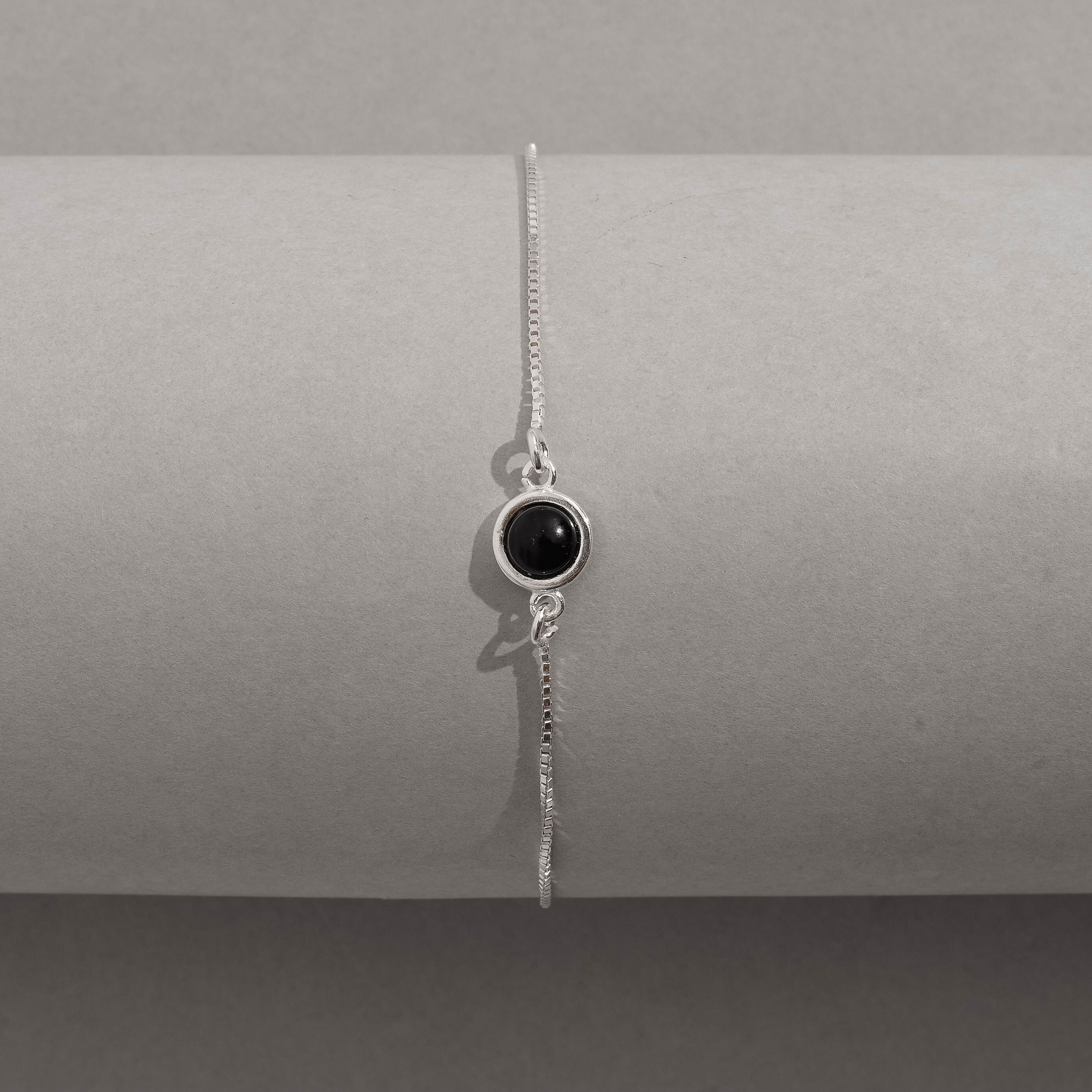 Imagem Secundária Pulseira entremeio pedra ônix 7mm v15 16cm com alongadora
