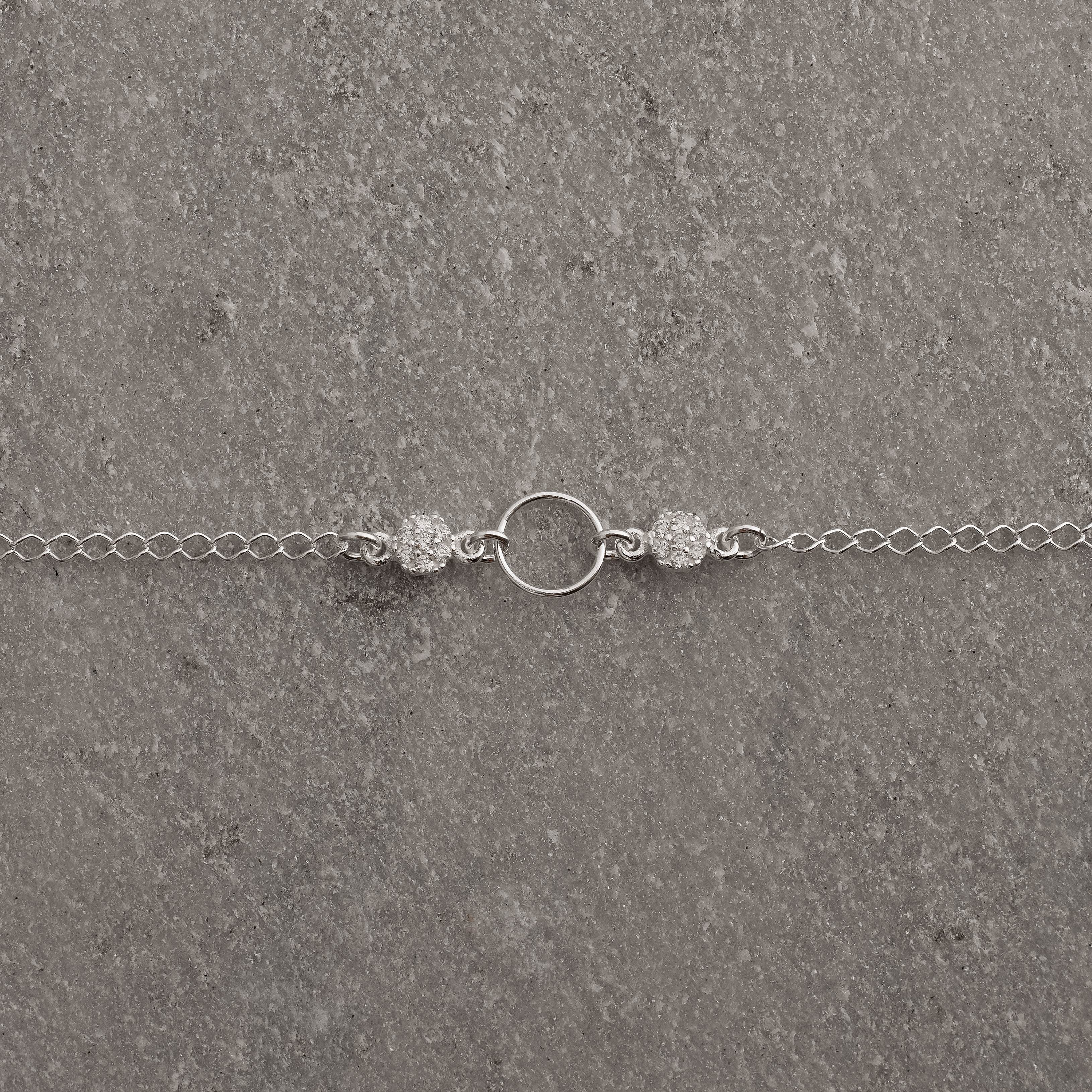 Imagem Secundária Pulseira entremeio círculo vazado 9mm com botões cravejados 18cm com alongadora