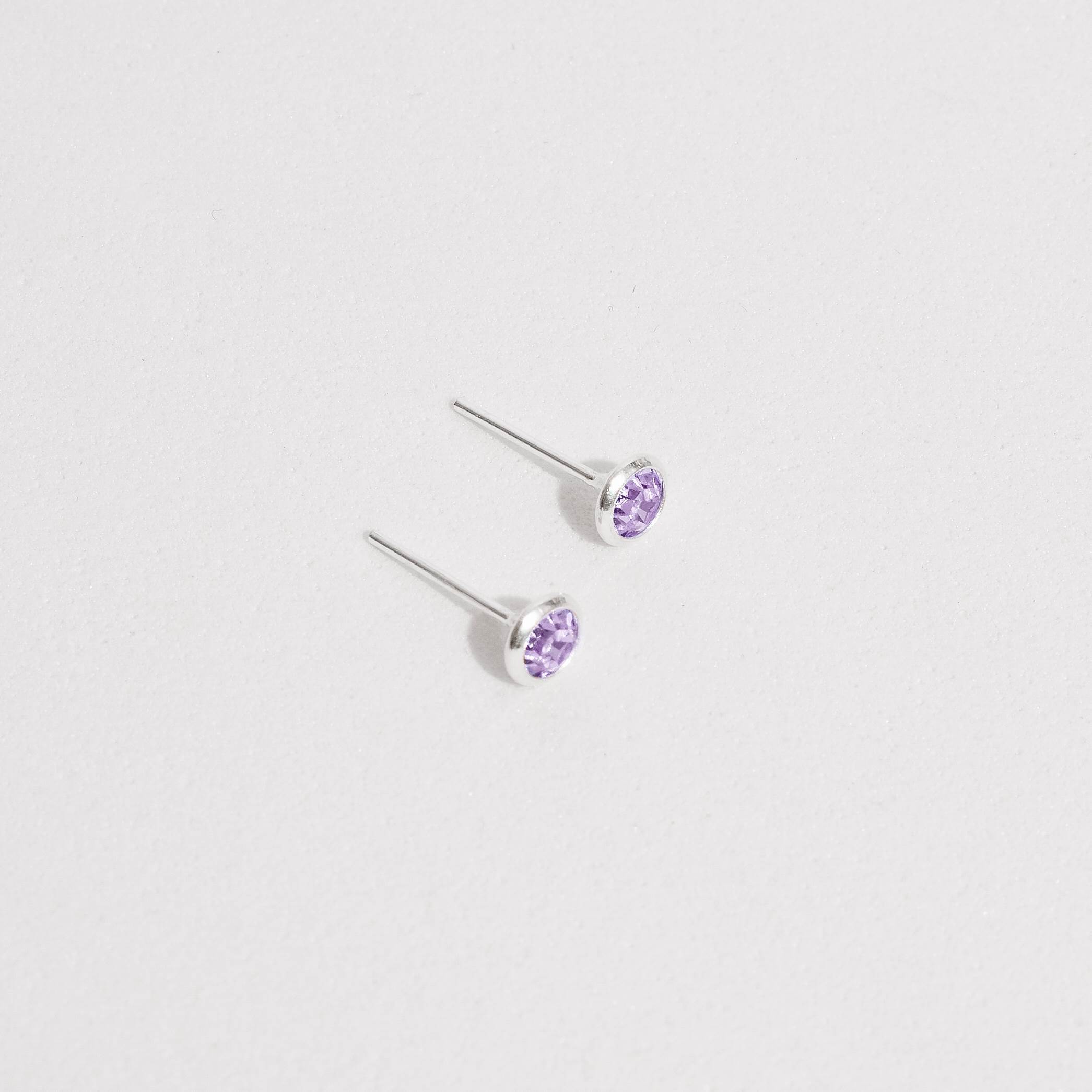 Imagem Secundária Brinco zircônia redonda embutida lilás 4mm