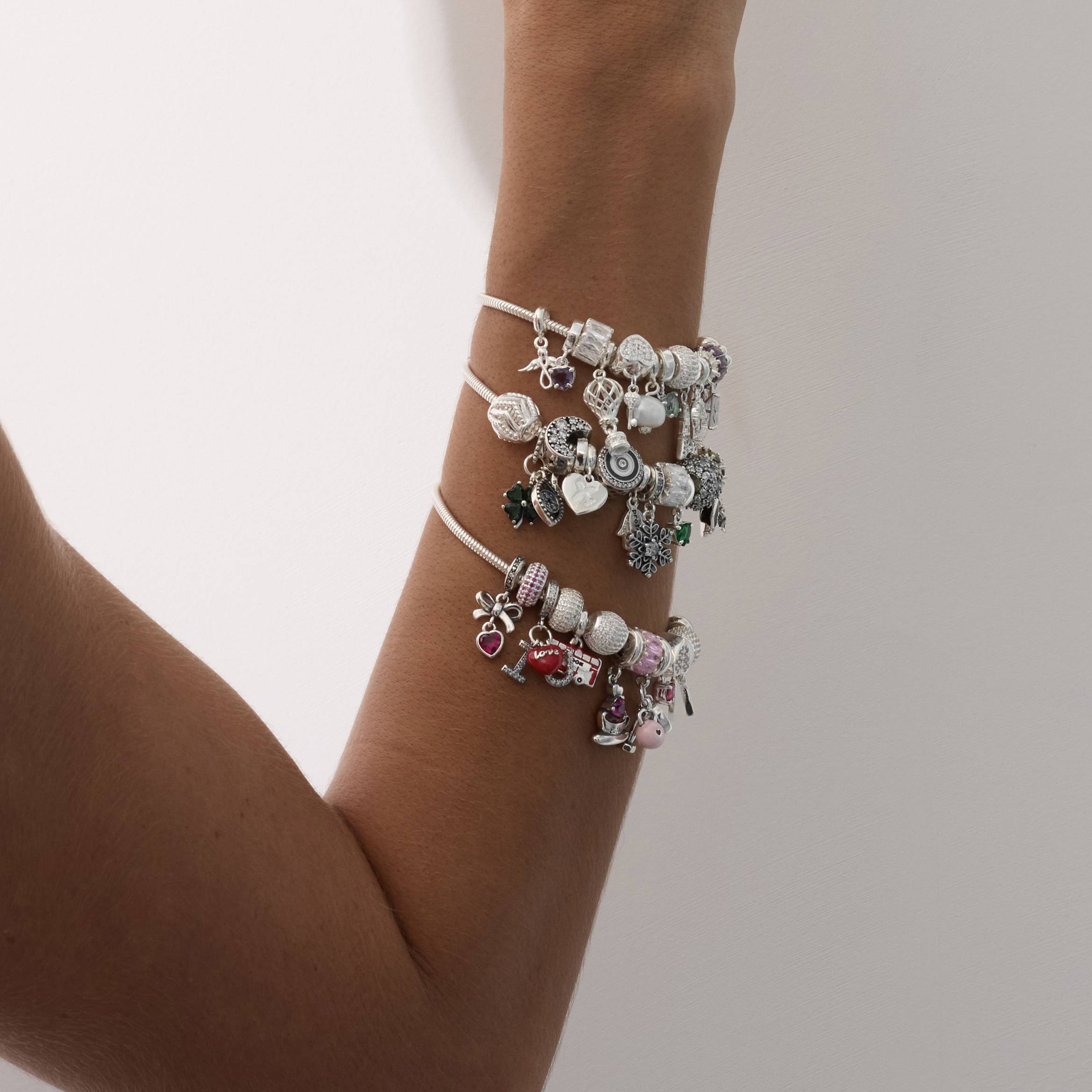 Imagem Secundária Berloque pingentes olho, trevo e ferradura com cravejado azul e verde envelhecido