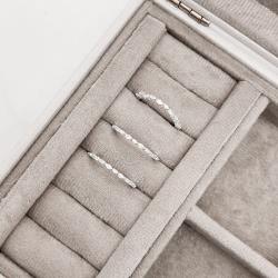 Anel zircônias redonda e navete